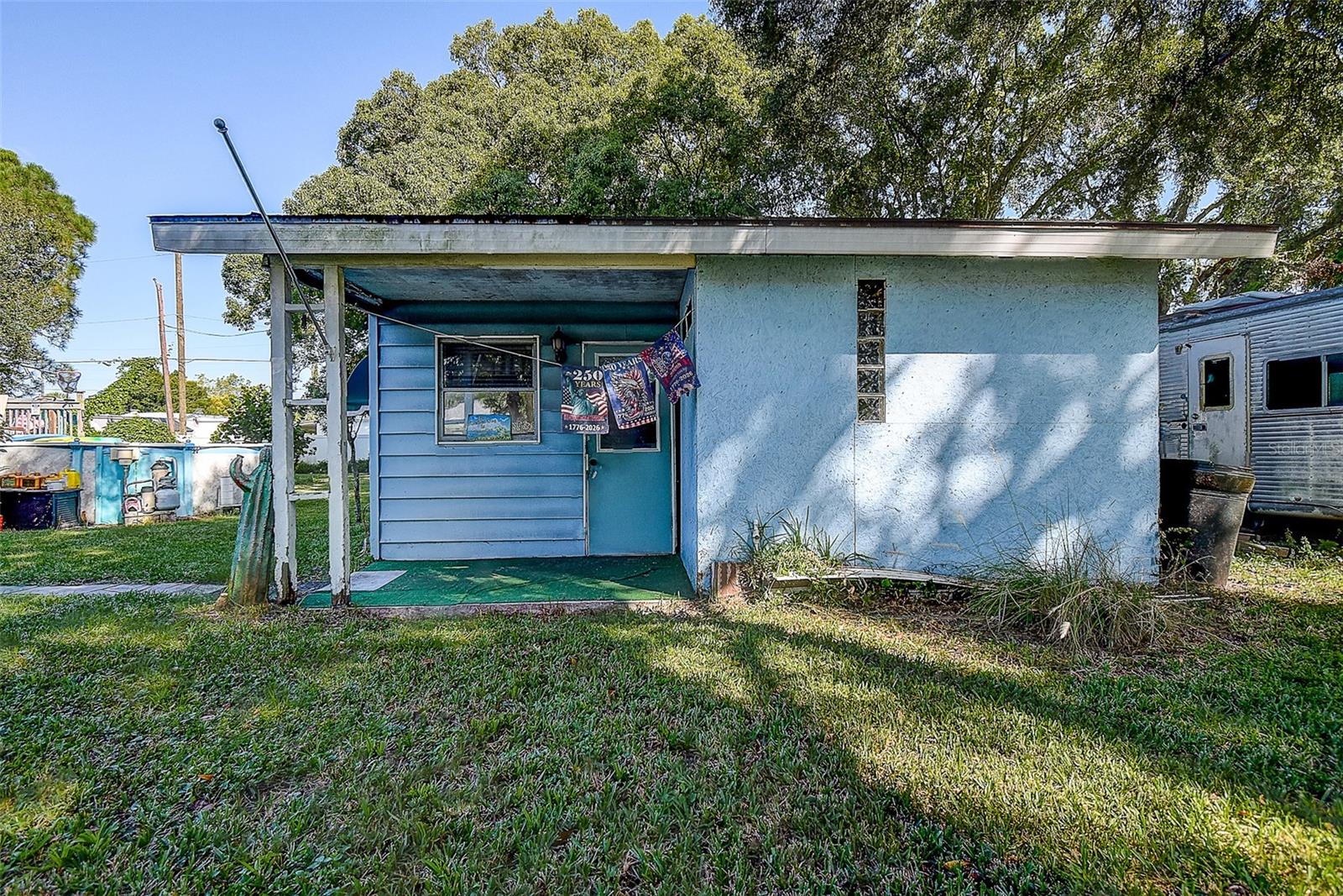 Cottage with 1 bedroom/living area and framed in bath with plumbing (needs finishing)