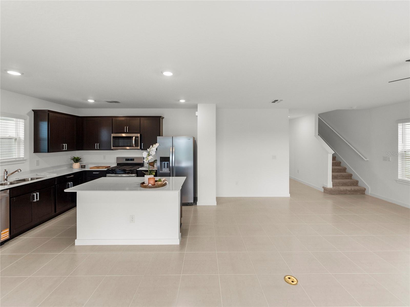 Open Main Living/Dining and Kitchen Area Open Main Living/Dining and Kitchen Area