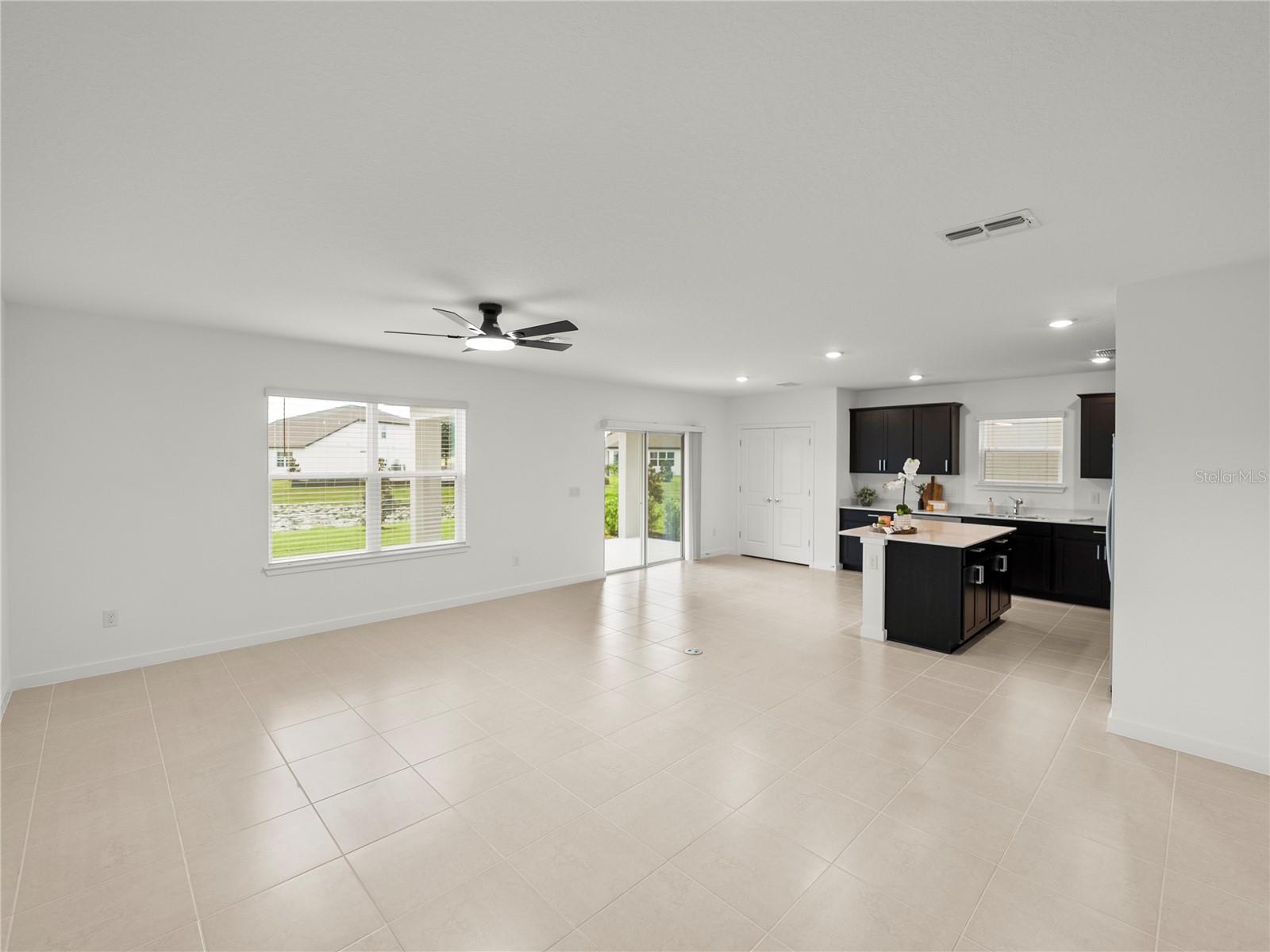 Main Living/Dining and Kitchen Area all Views to Conservation and Pond Main Living/Dining and Kitchen Area all Views to Conservation and Pond