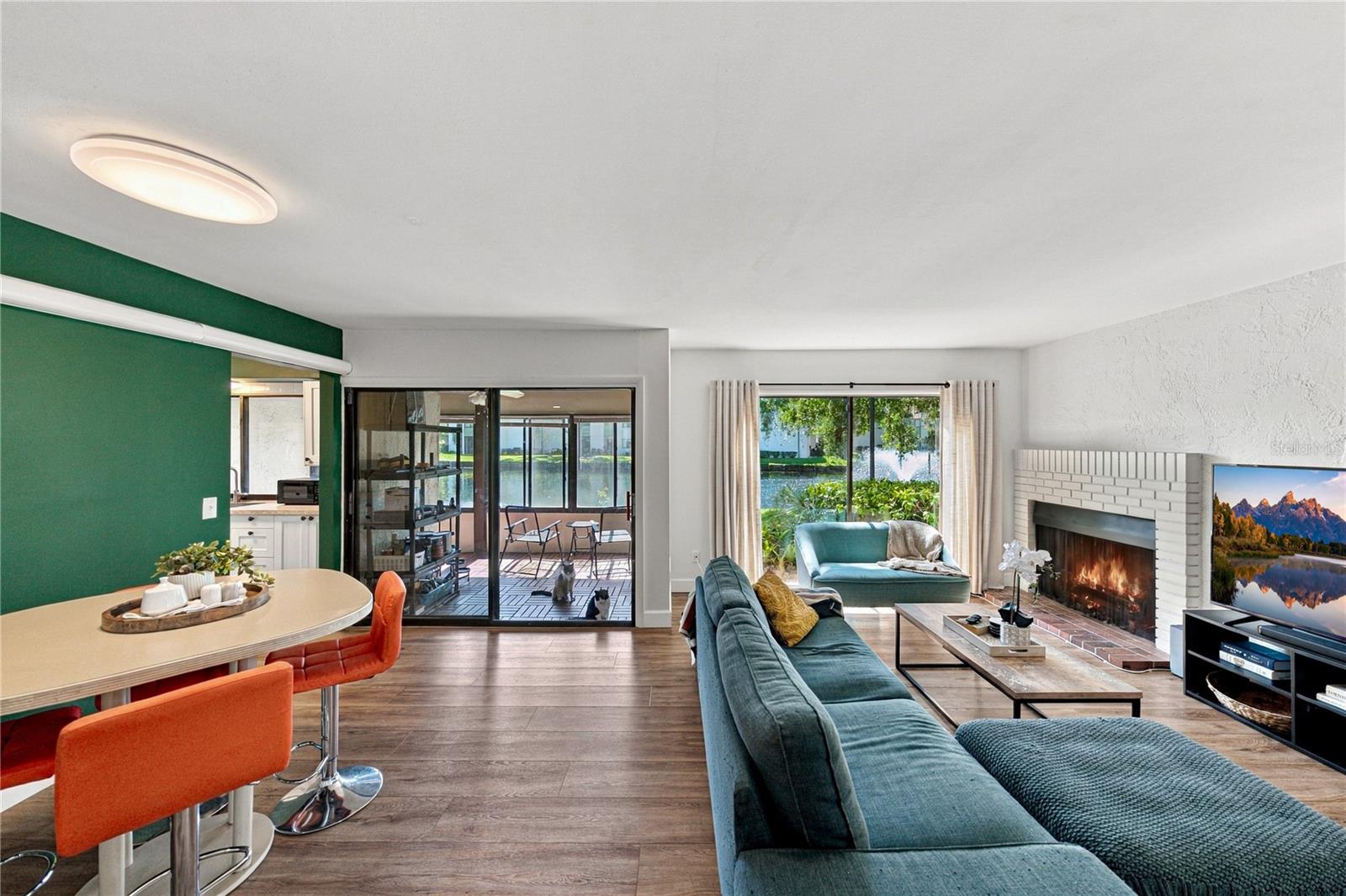 Charming Living Room Area with Beautiful Wood Burning Fireplace
