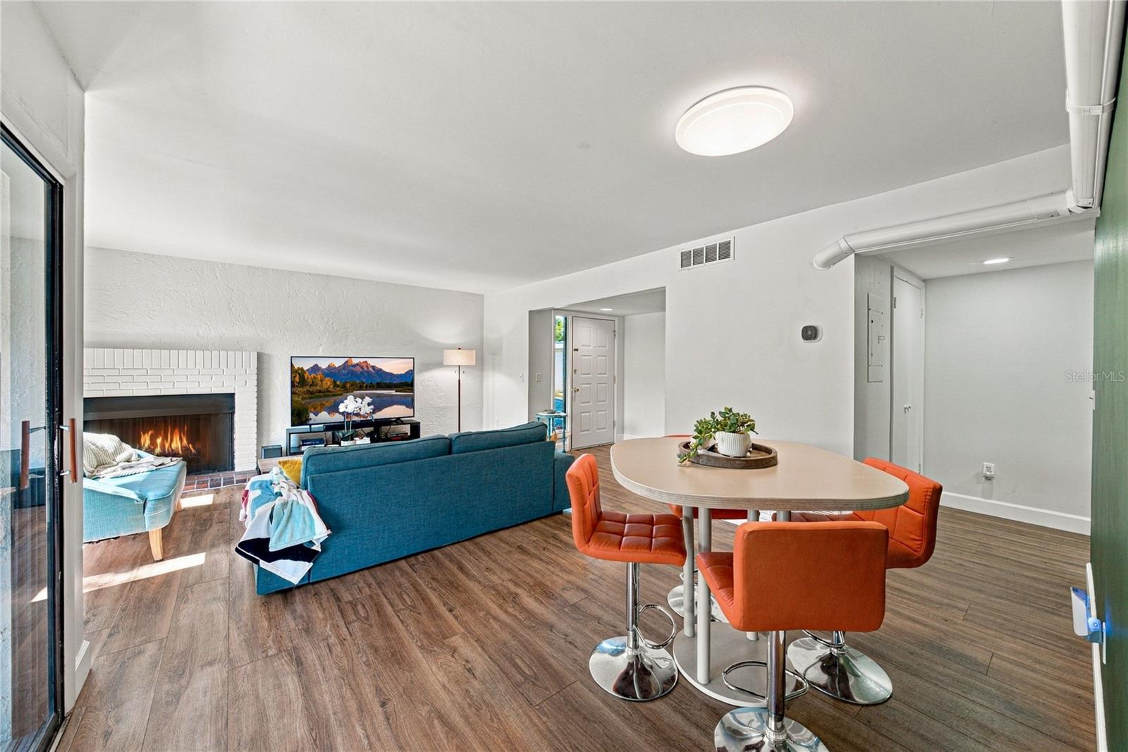 Light and Bright Luxury Vinyl Plank Flooring throughout Great Room