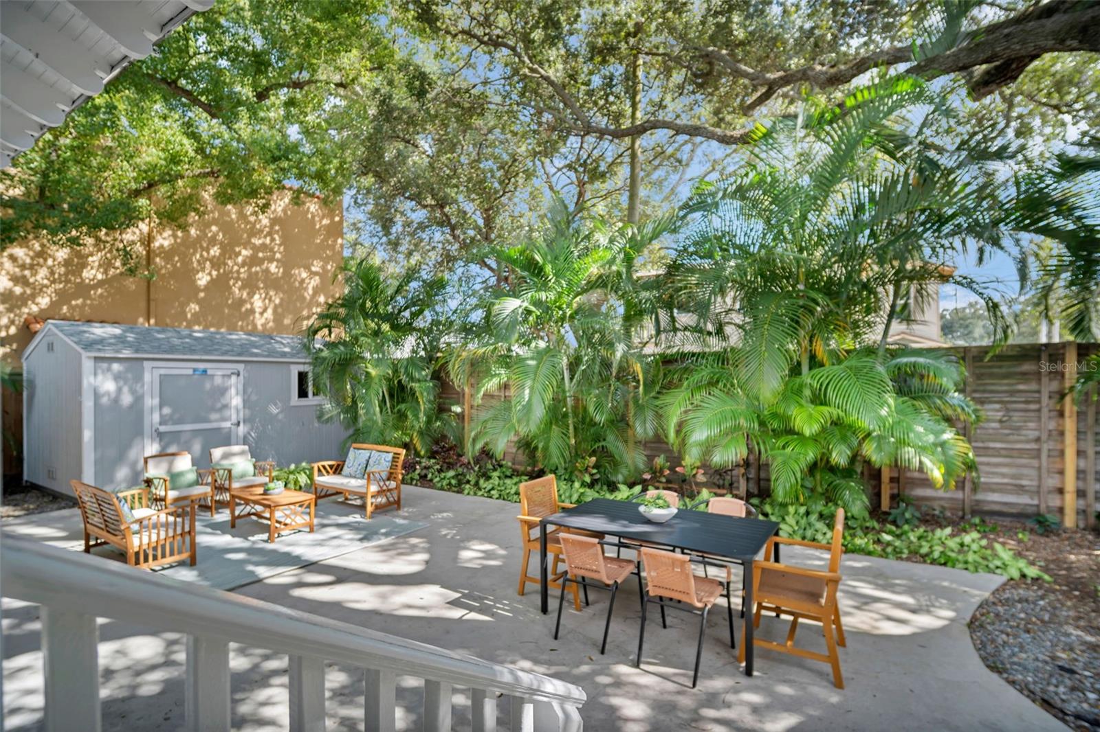 fenced in backyard with shed