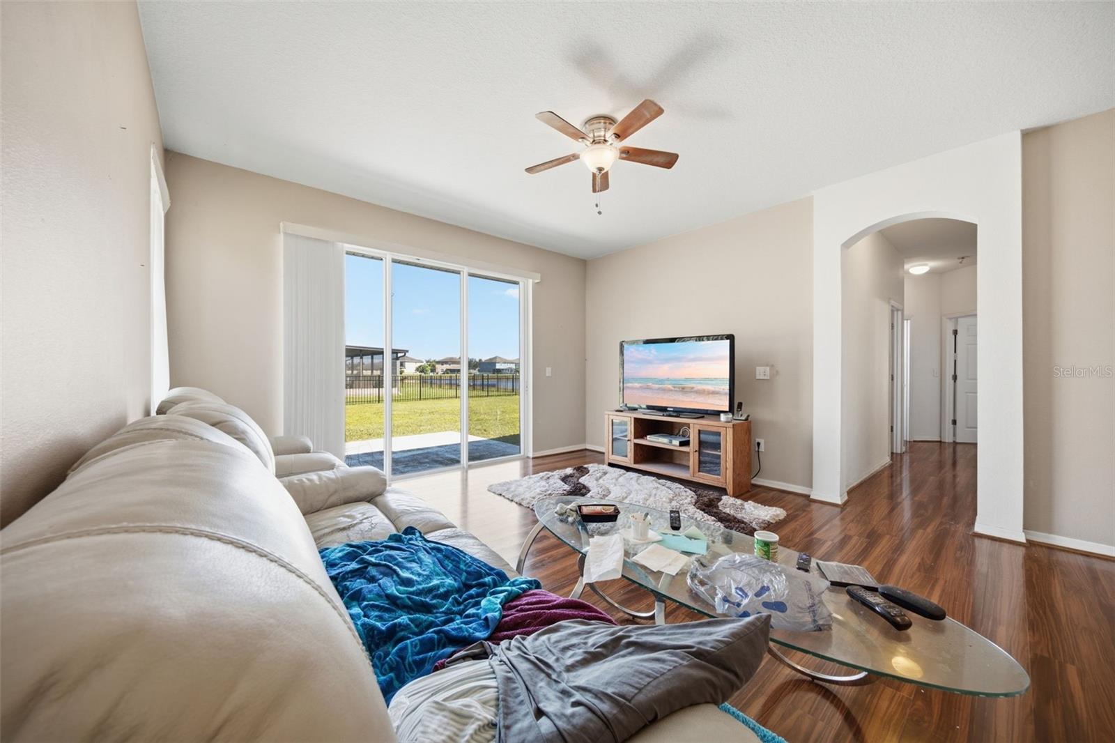 Family room with pond view through sliders