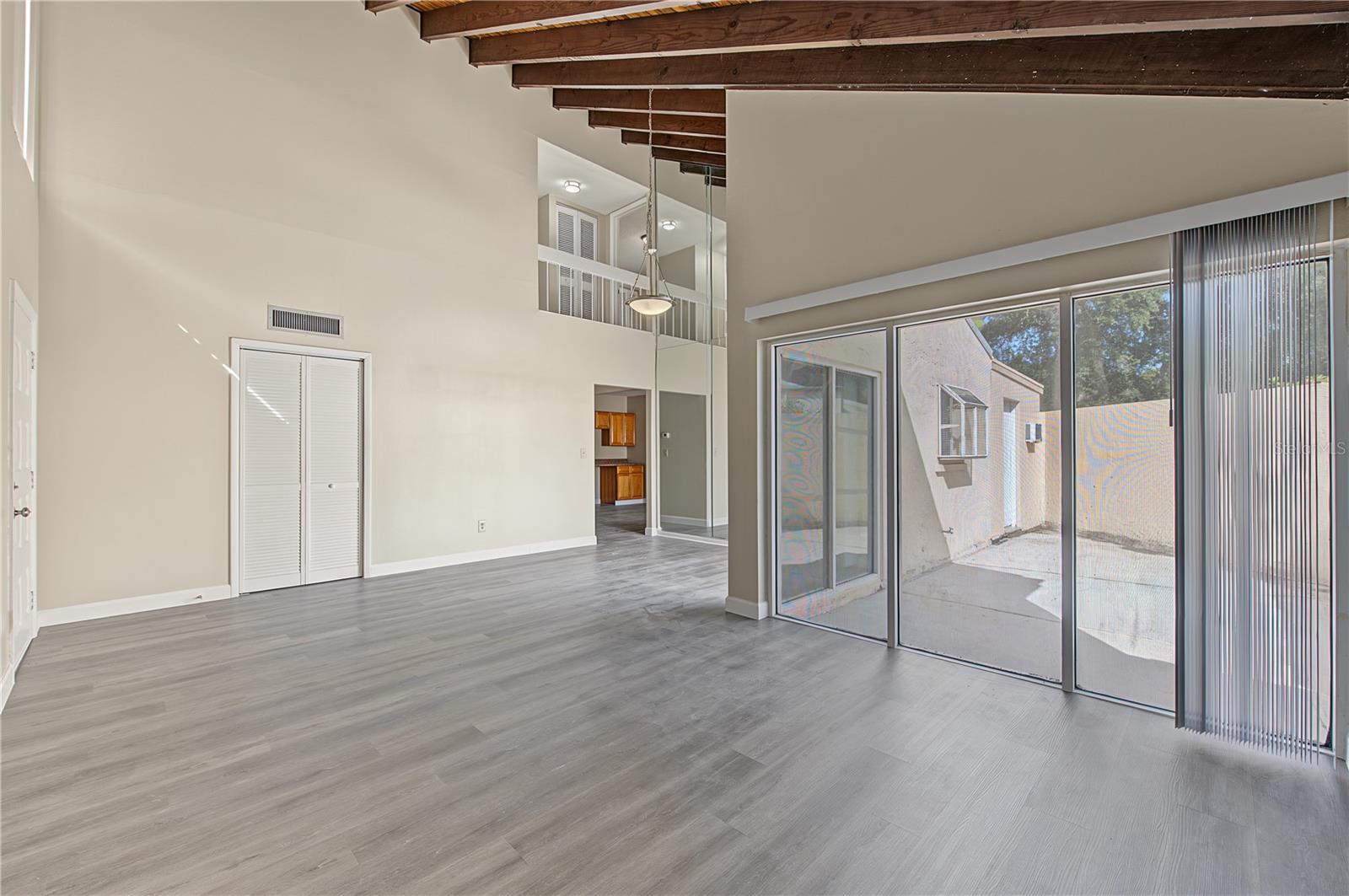 Spacious Family and Dining Room, Vaulted Ceilings and lots of sunlight.