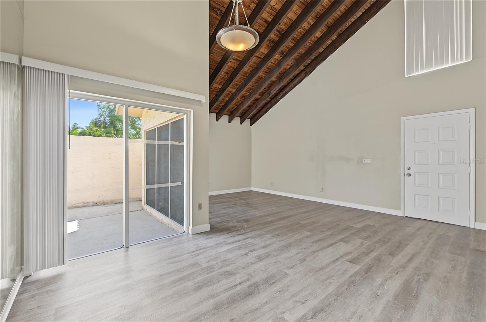 Dining Room, Private walled outside patio to the right, lots of sunlight.