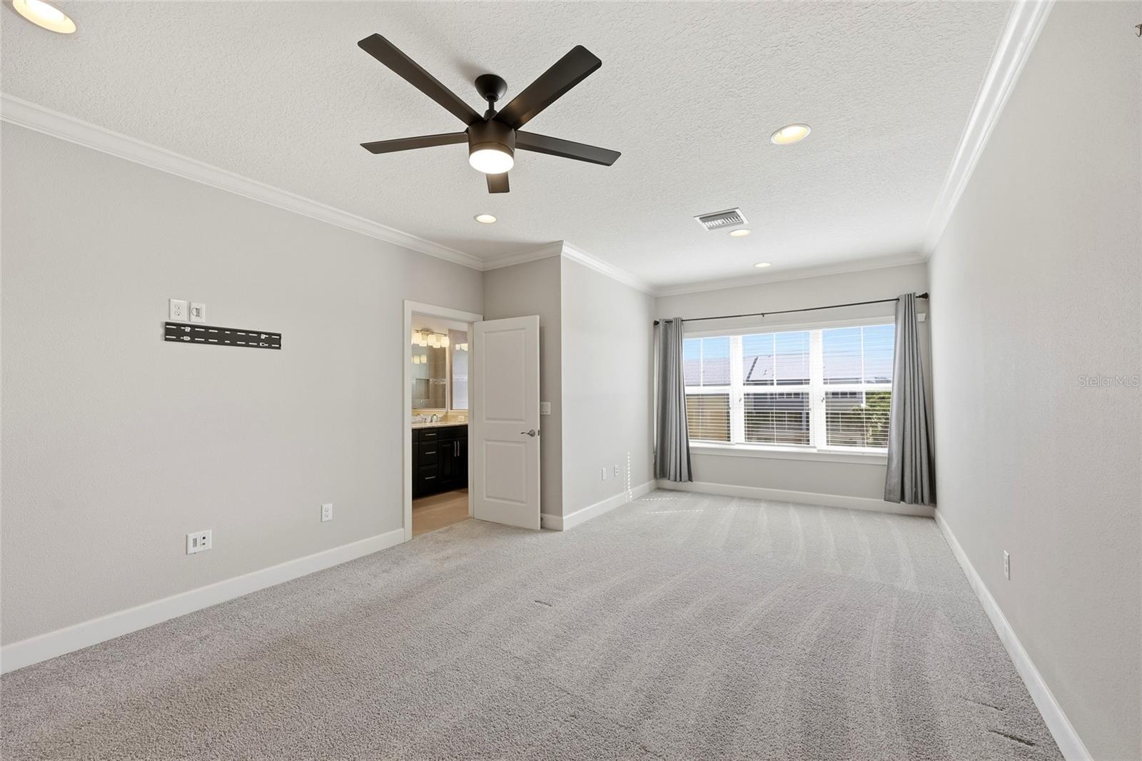 Master bedroom with sitting area and on suite bathroom