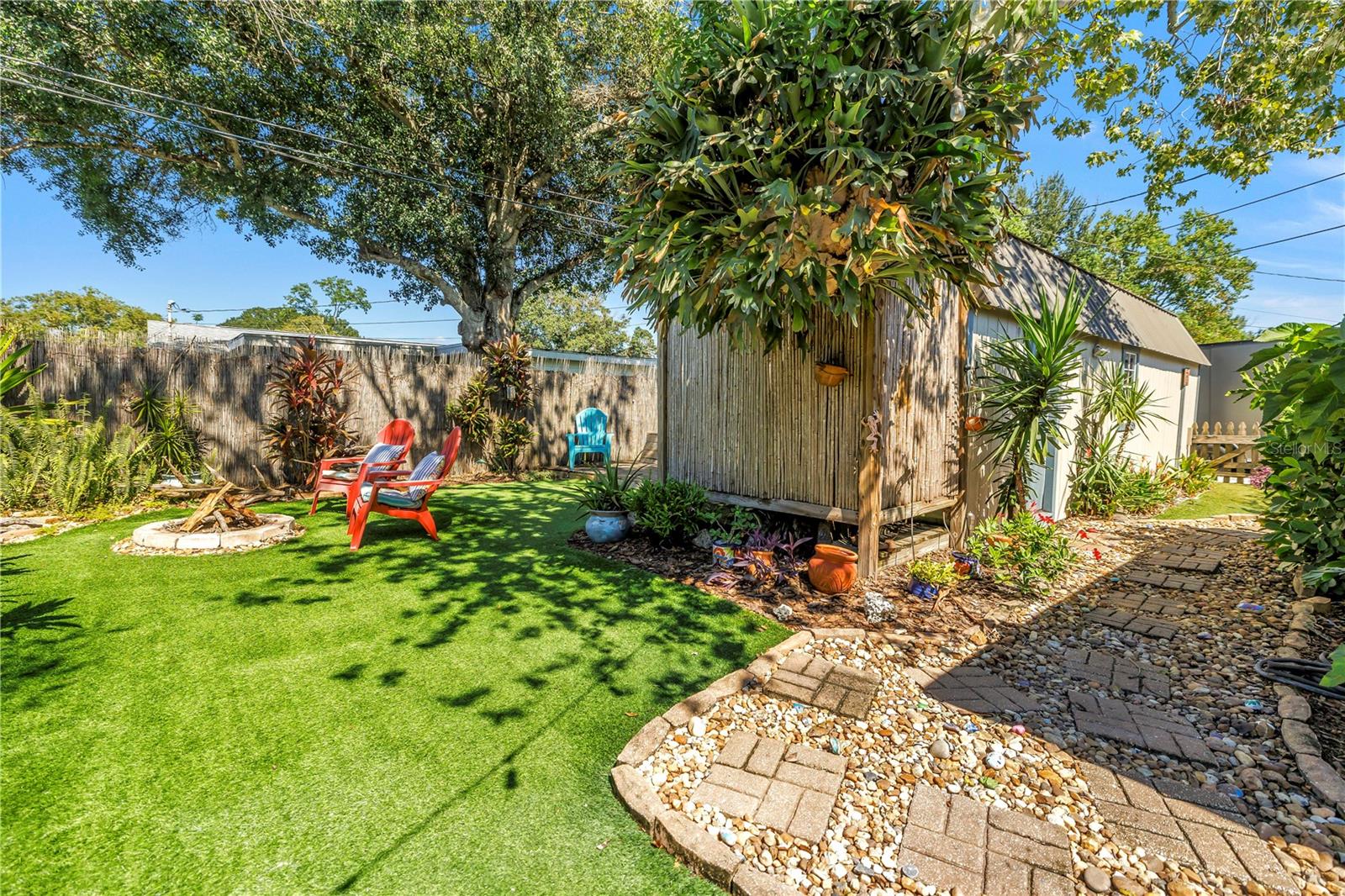 Notice the bamboo enclosure. That's where the outdoor heated shower area, concealed with the bamboo for your privacy.