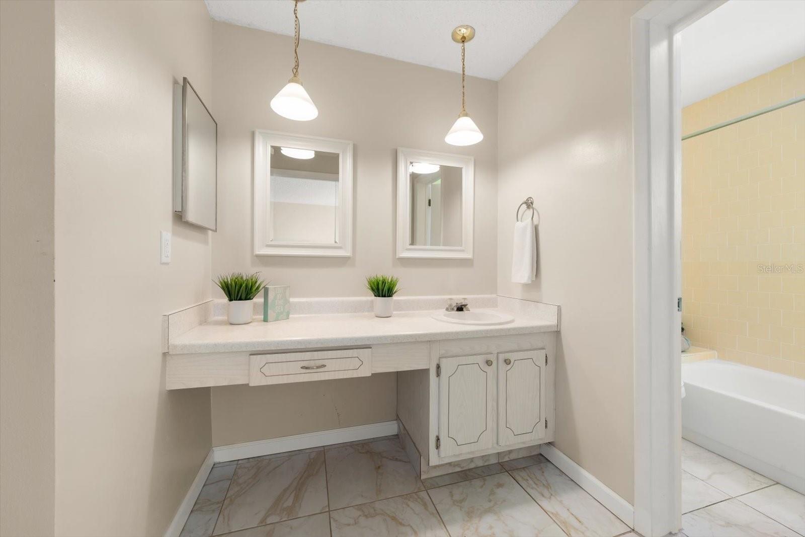 Primary en suite bath with vanity