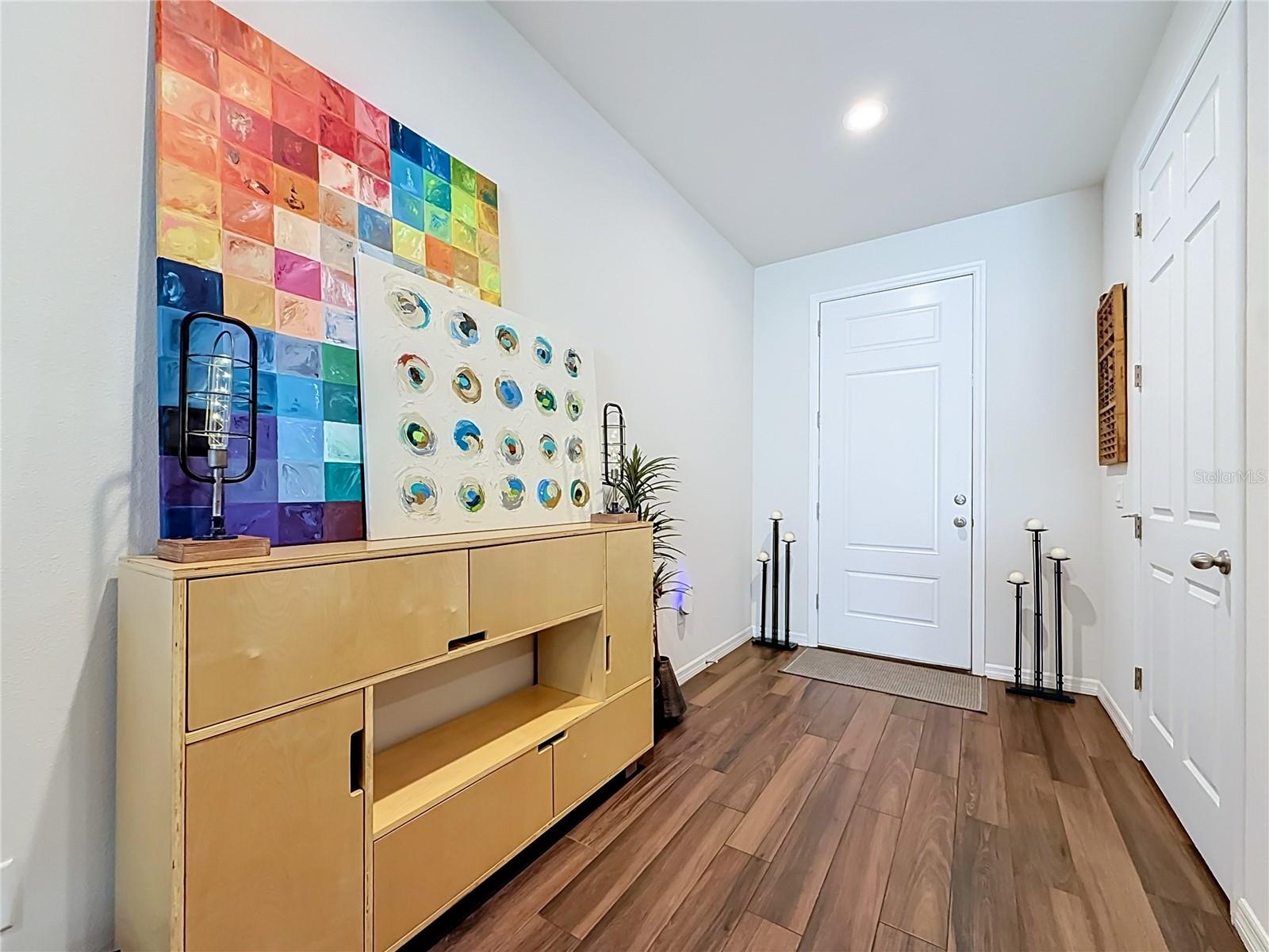 Step inside to discover a spacious OPEN FLOOR PLAN with soaring ceilings and beautiful WOOD-LOOK TILE flooring throughout the downstairs living areas. Step inside to discover a spacious OPEN FLOOR PLAN with soaring ceilings and beautiful WOOD-LOOK TILE flooring throughout the downstairs living areas.