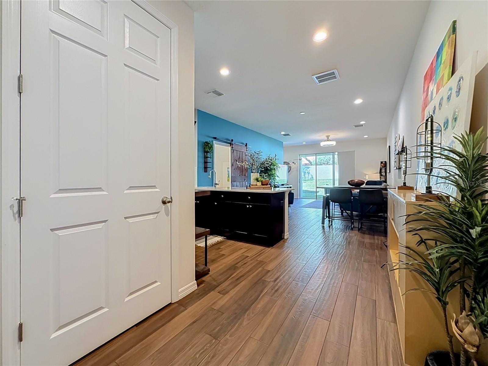 Step inside to discover a spacious OPEN FLOOR PLAN with soaring ceilings and beautiful WOOD-LOOK TILE flooring throughout the downstairs living areas. Step inside to discover a spacious OPEN FLOOR PLAN with soaring ceilings and beautiful WOOD-LOOK TILE flooring throughout the downstairs living areas.