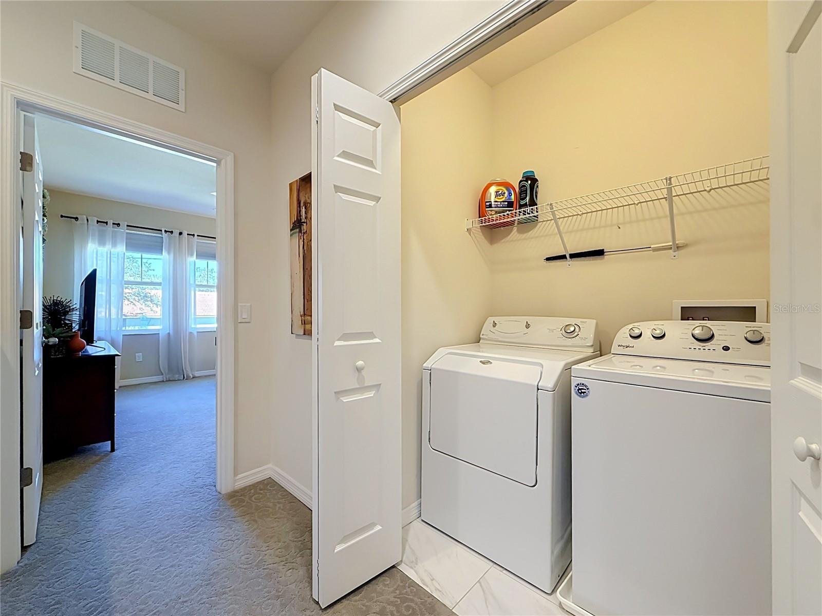 INSIDE LAUNDRY CLOSET with WASHER AND DRYER INCLUDED
