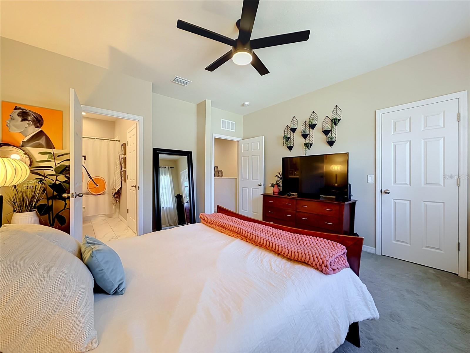 Primary Suite features an en-suite bath and WALK-IN CLOSET