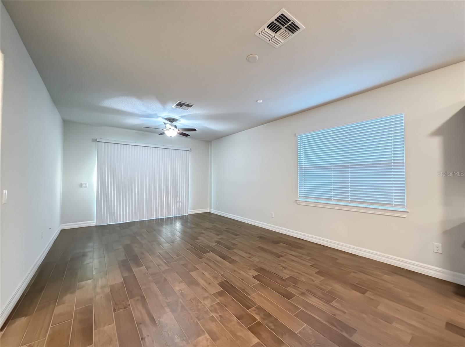Living Room with Sliders to Screened Porch