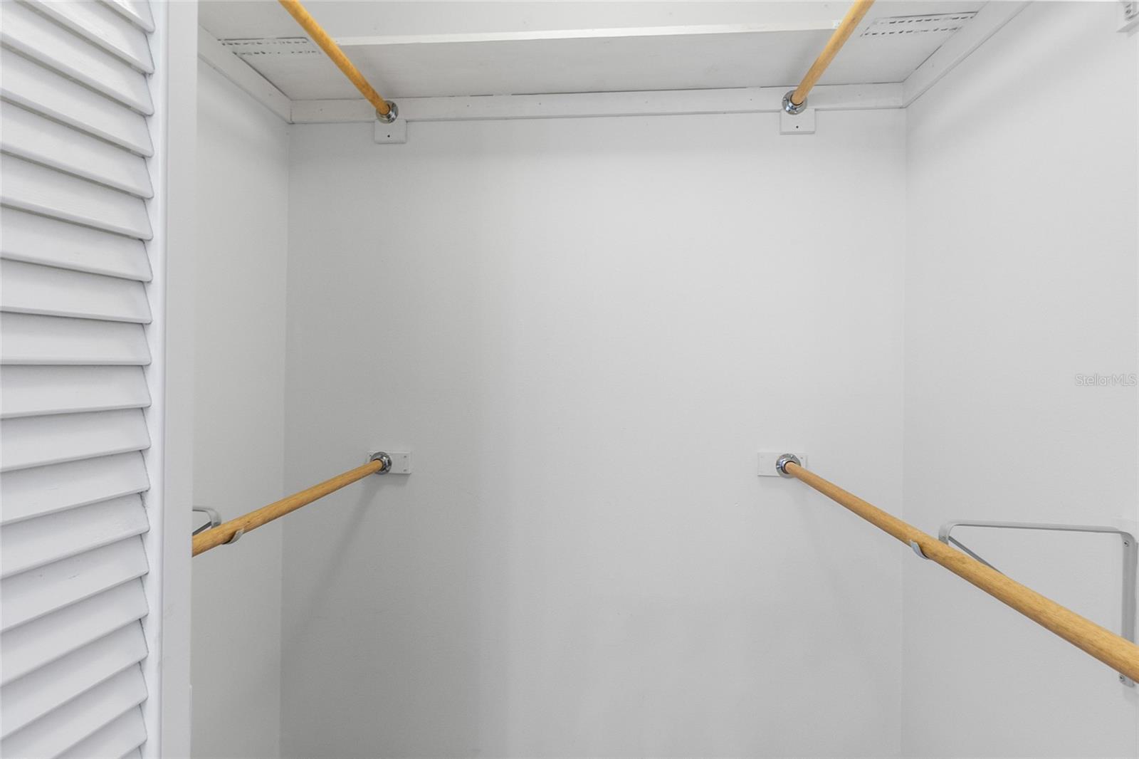 Spacious walk in closet in primary suite