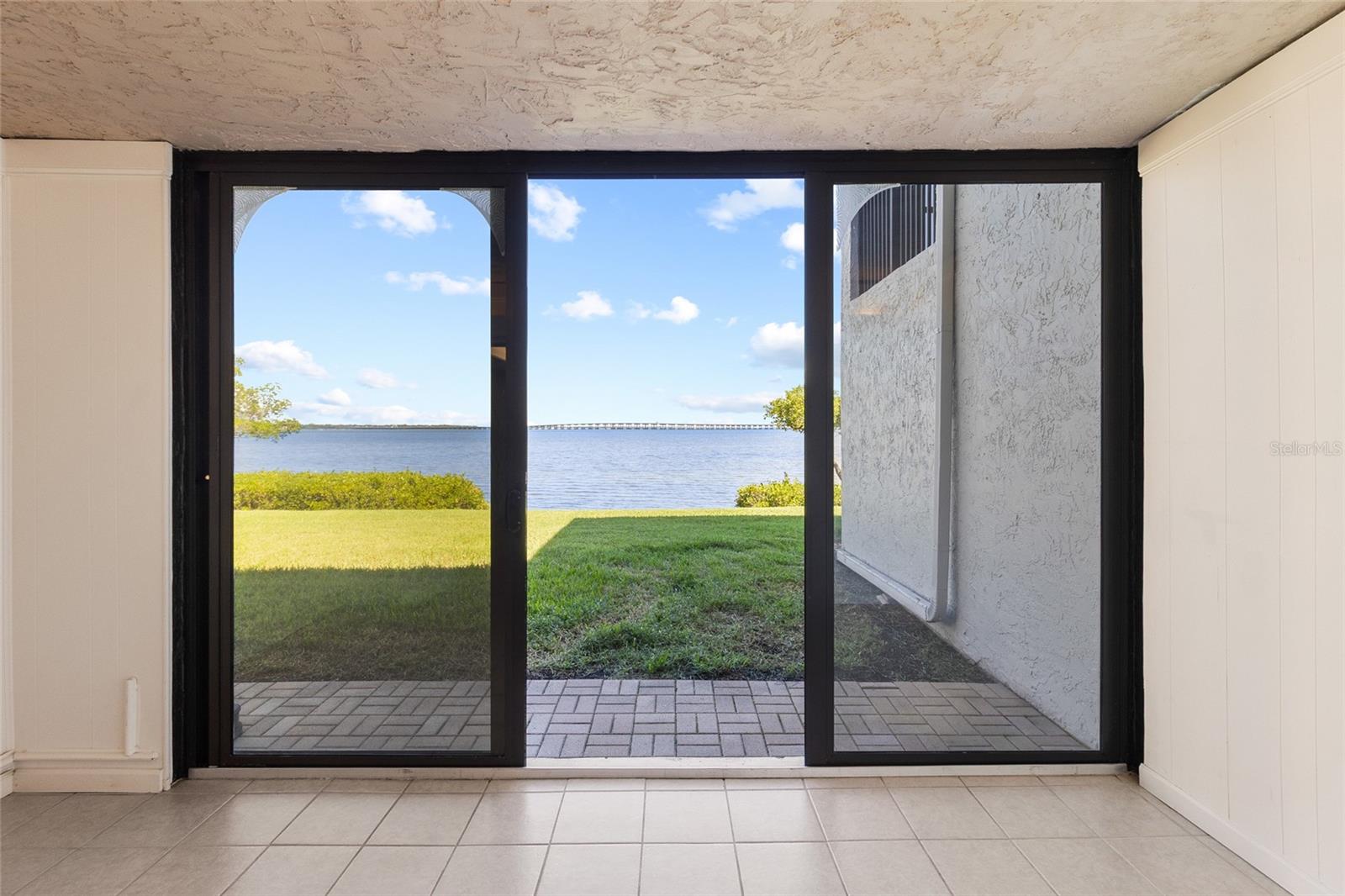 Sunroom -  off living area with full water view