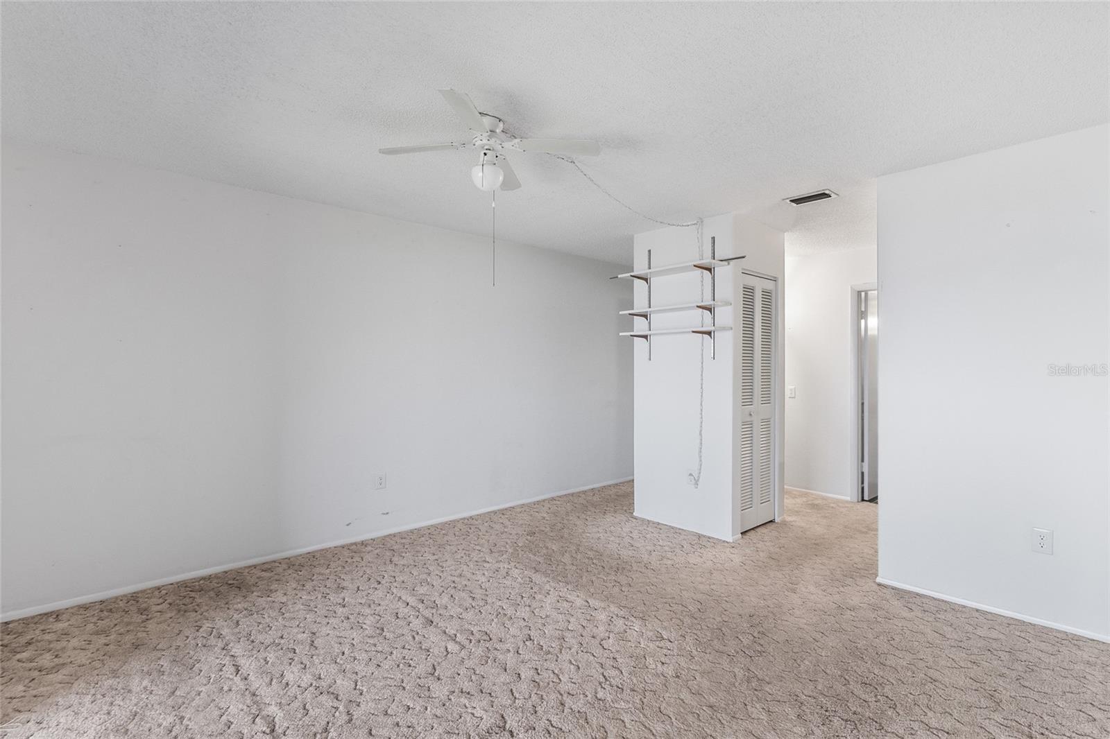 Primary suite looking toward closets and ensuite bath