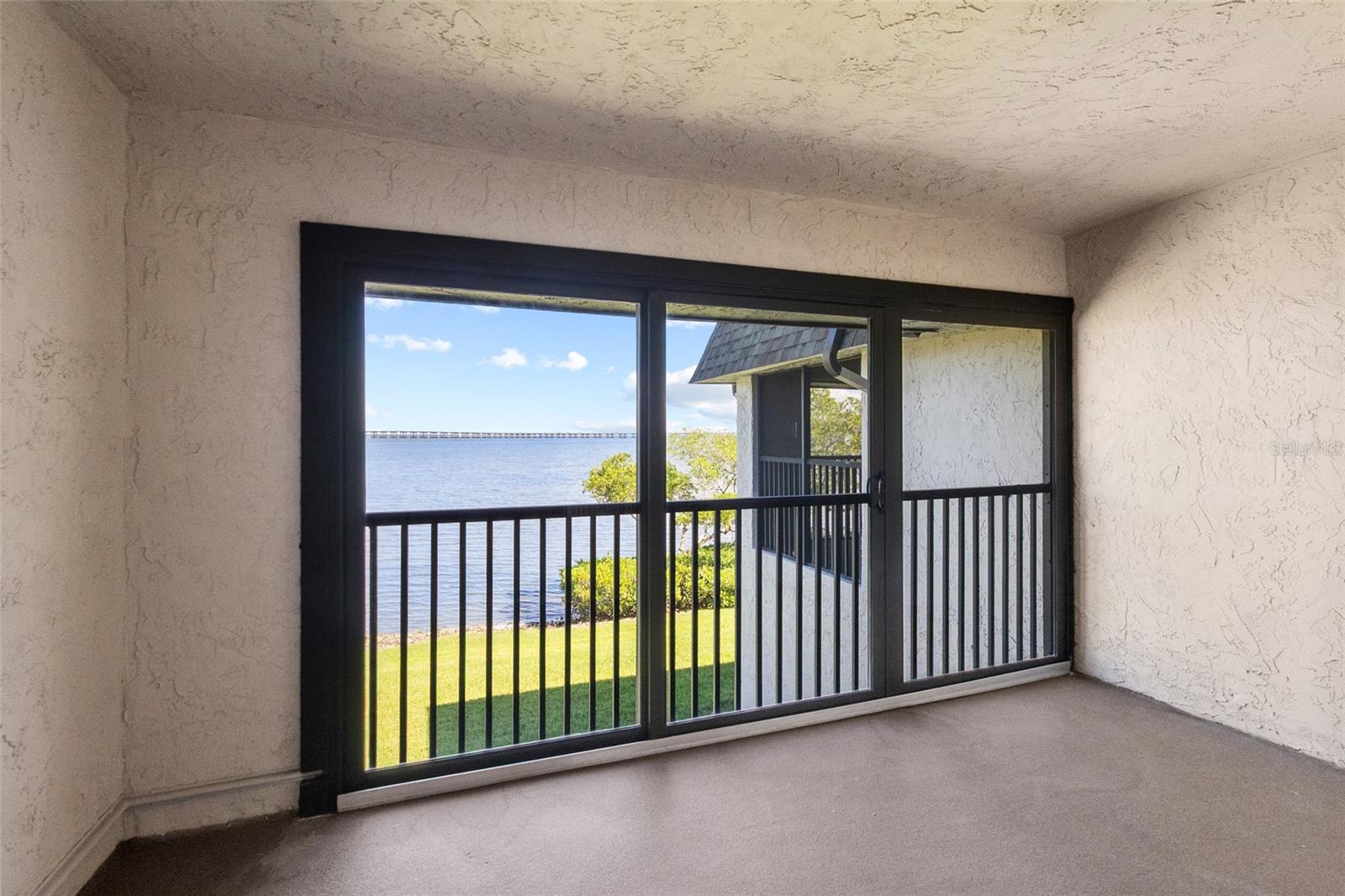 Balcony off primary bedroom - full panoramic water views