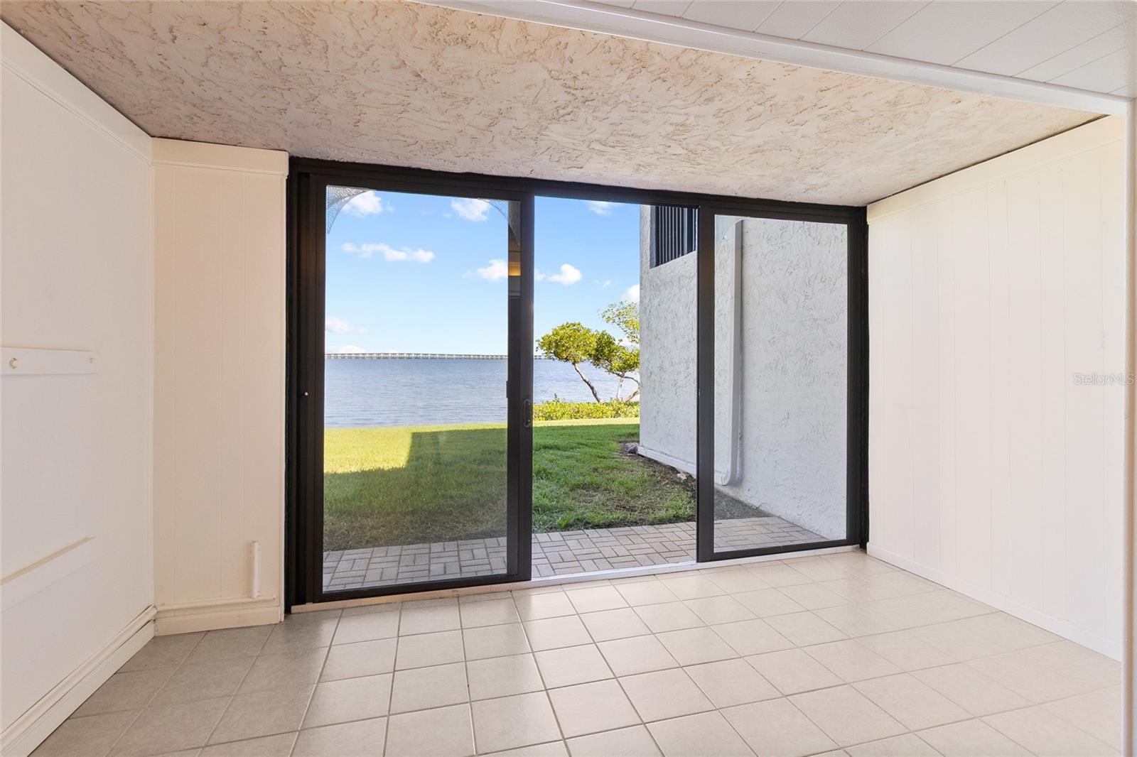 Sunroom directly off Living area - full water view.