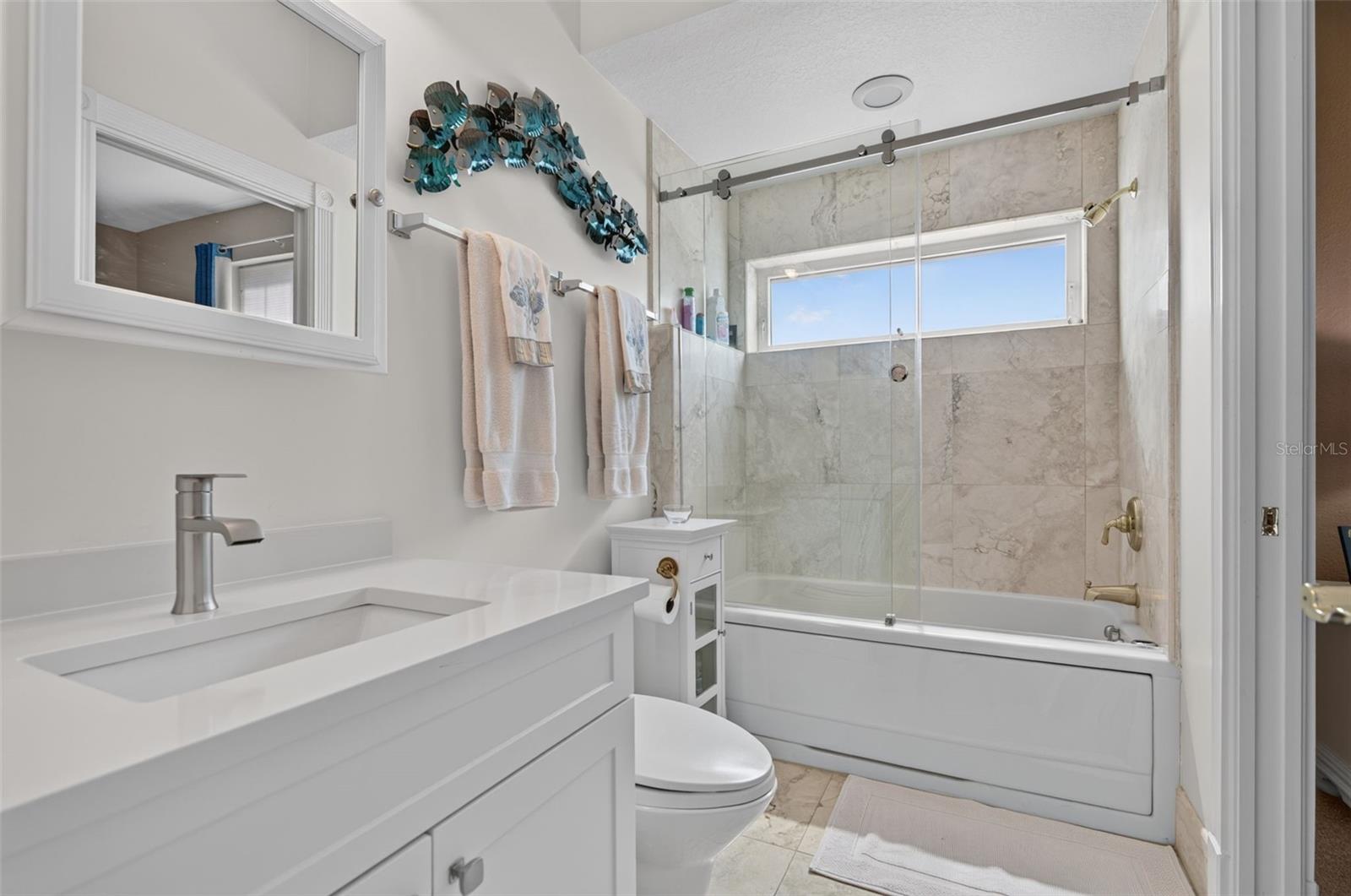GUEST BATH EN SUITE BEDROOM 3 JACUZZI TUB