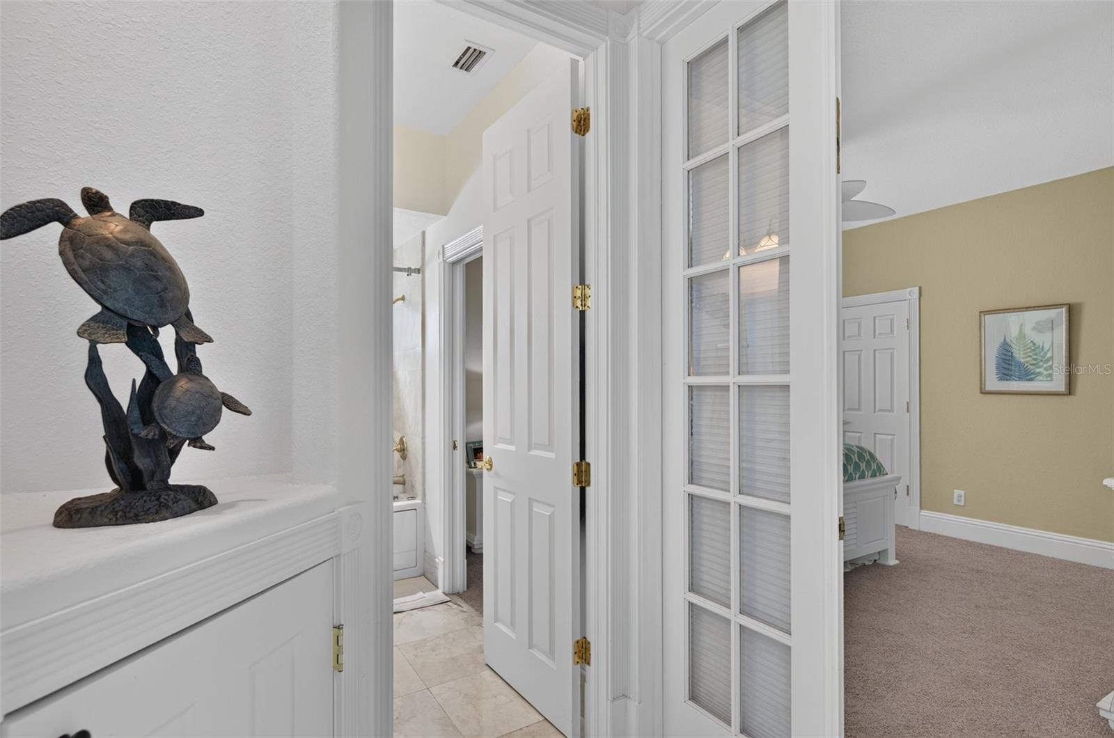 ENTRY BEDROOM 3 & SHARED GUEST BATH