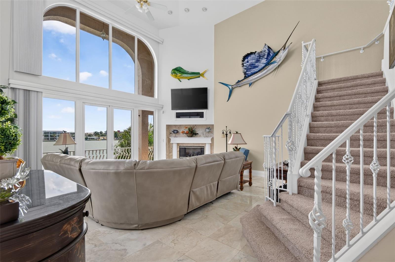 FAMILY ROOM & STAIRS TO LOFT