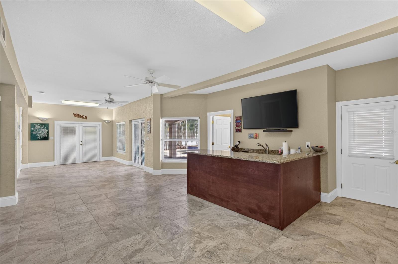 BONUS AREA BAR ELEVATOR ACCESS & DOORS TO EAST GARAGE