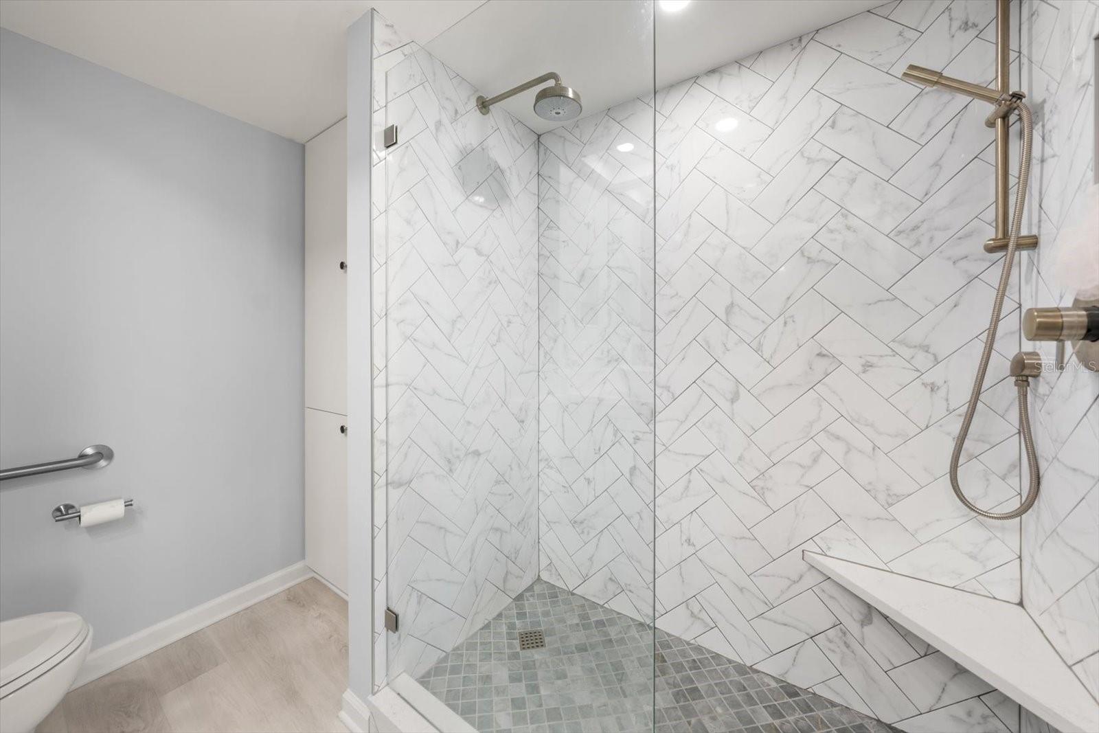 Exquisite shower in primary En suite bath is an oasis in itself.