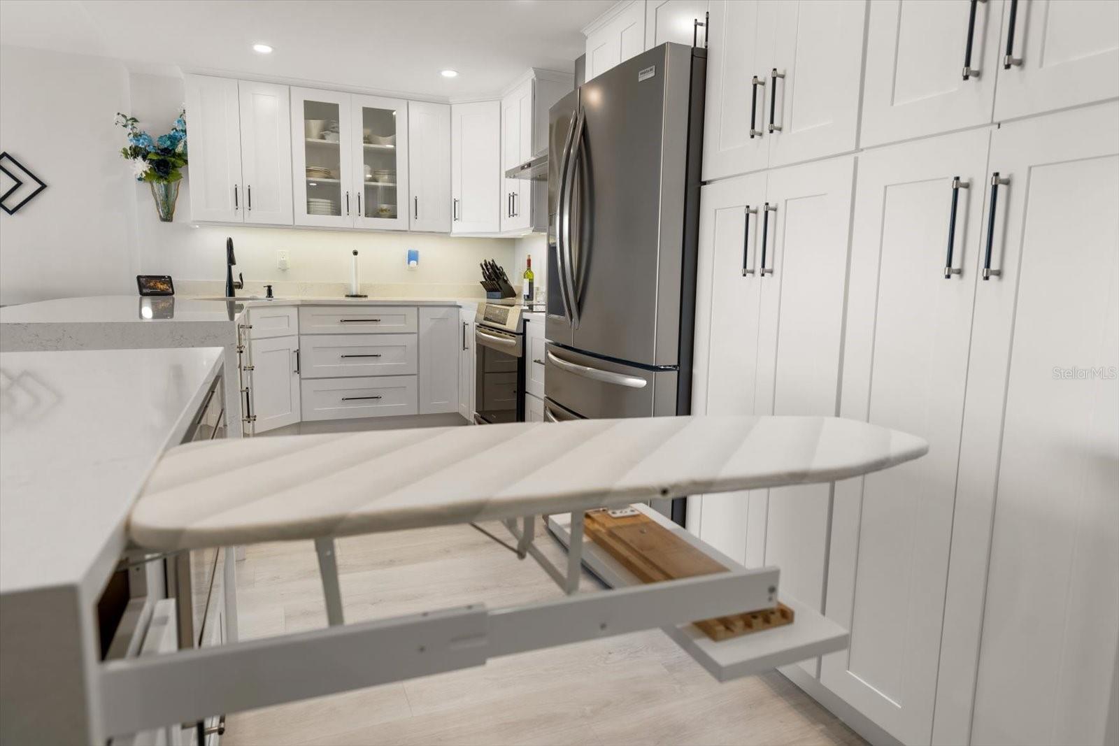 Built in Ironing Board that neatly tucks away.