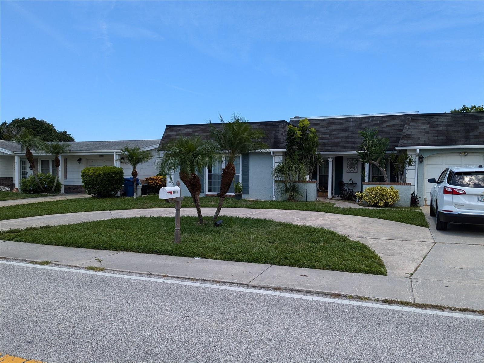CIRCULAR DRIVEWAY AND EXTRA WIDE DRIVEWAY