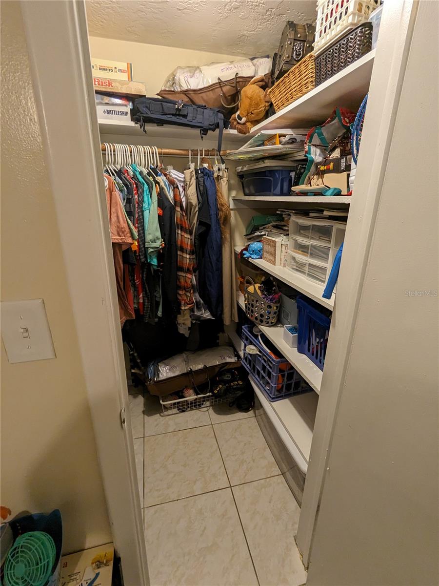 WALK-IN CLOSET IN GUEST BEDROOM