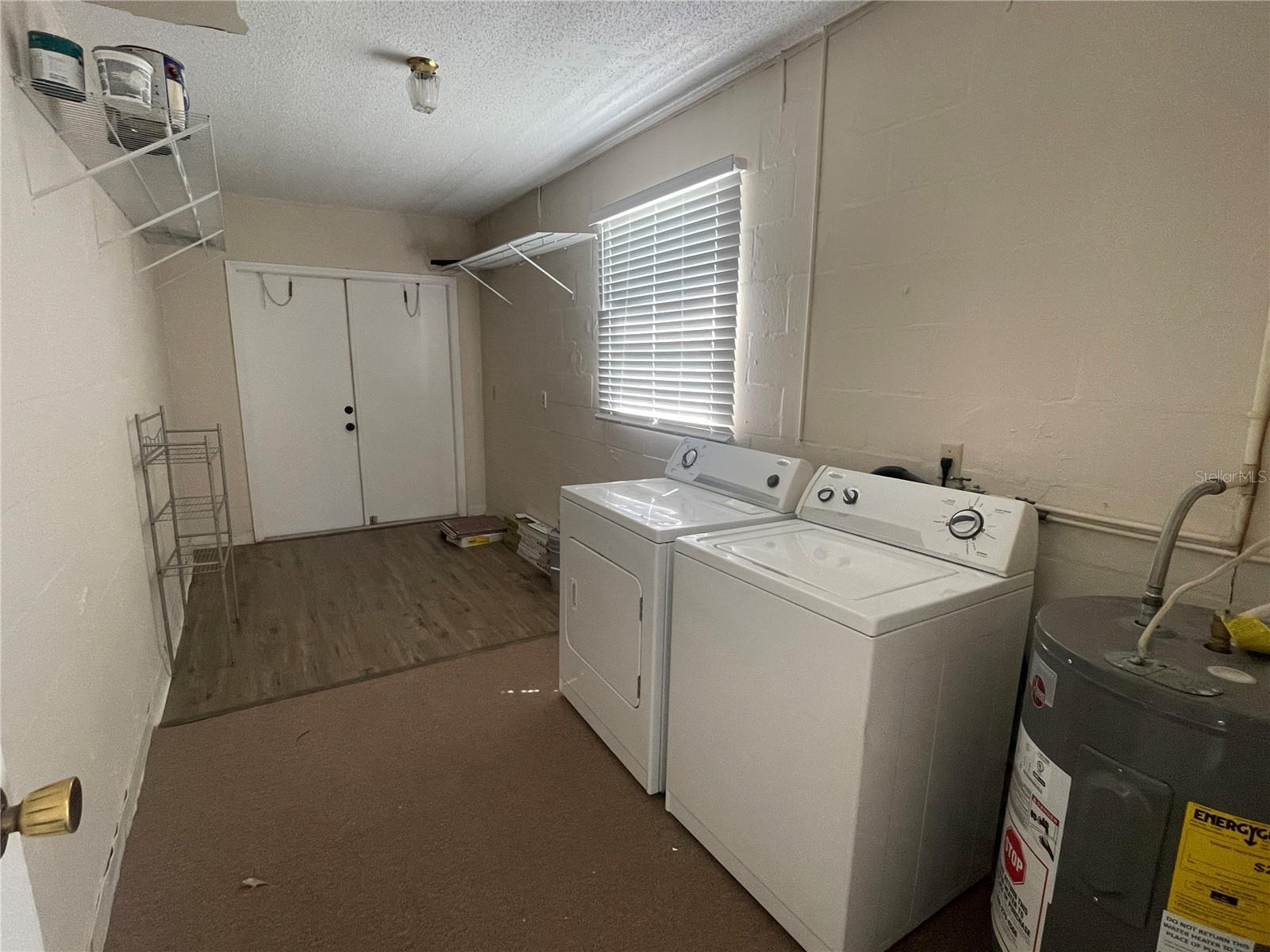 Storage area/ laundry off Florida Room.
