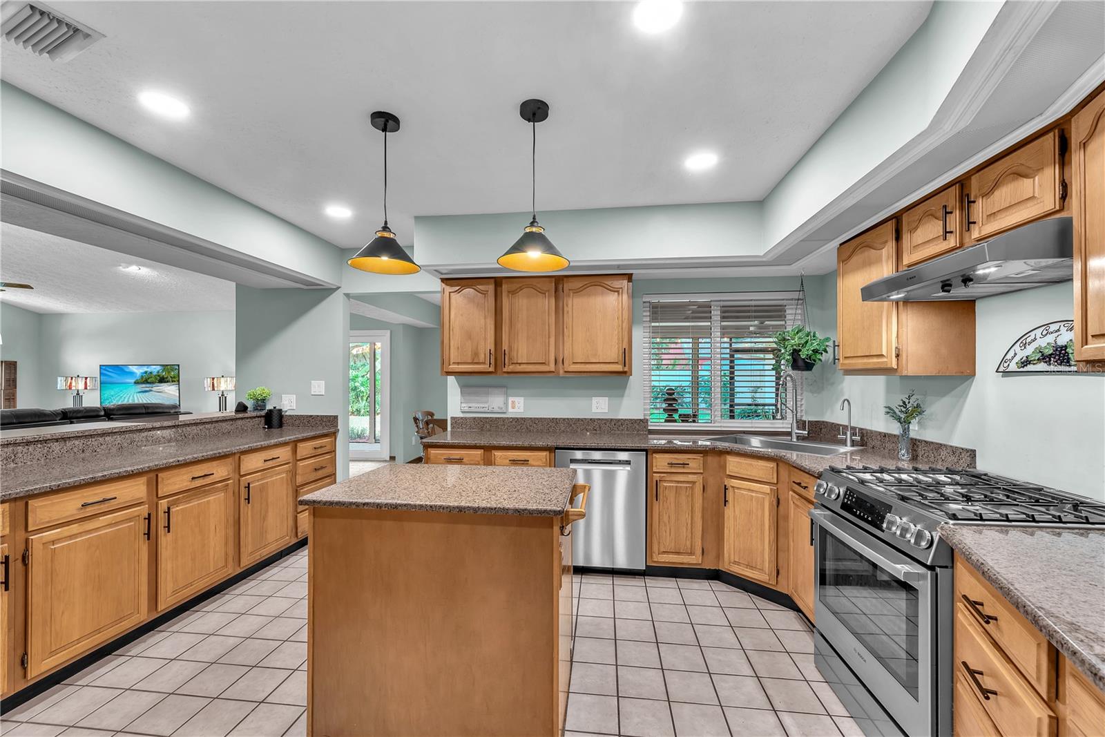 Recently upgraded Bosch stainless steel appliances with gas range with convention baking.