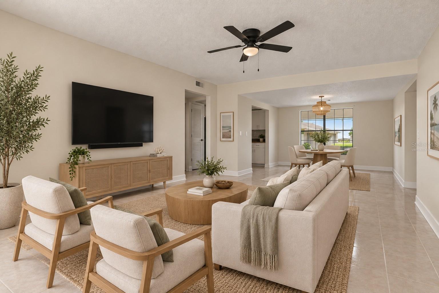 Virtually Staged - The Living Room is light, bright, and open with a lovely natural flow.