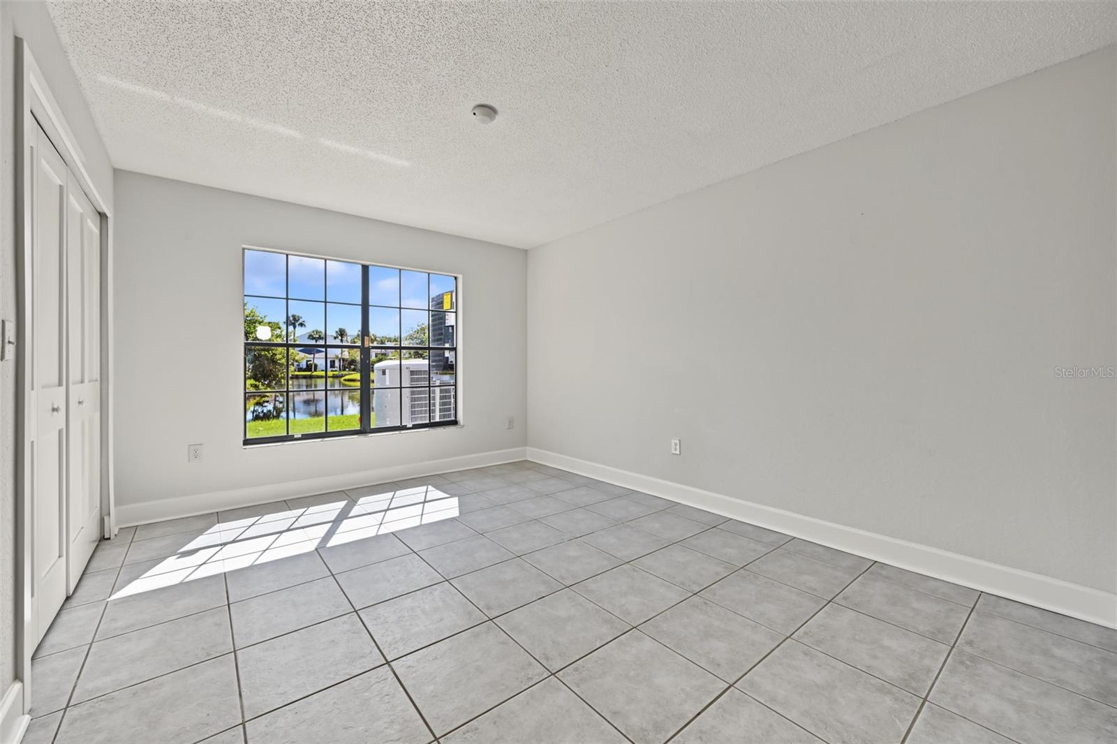 Bedroom Two also has views of the water and the hall bathroom is located just outside.