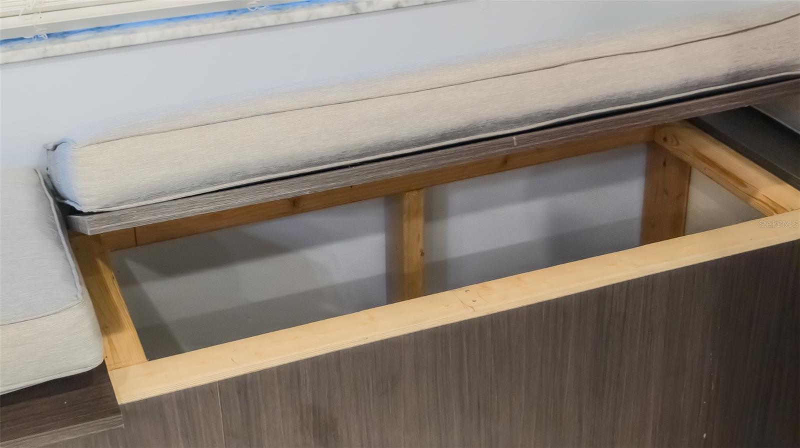 Storage cabinets under the bench seating