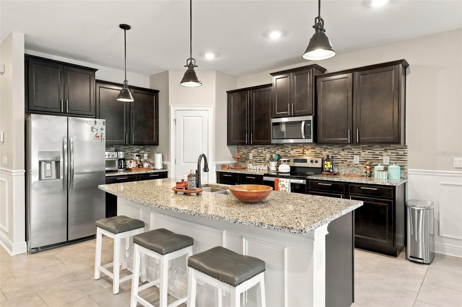 Spacious Kitchen with Ample Cabinetry and Counter Space