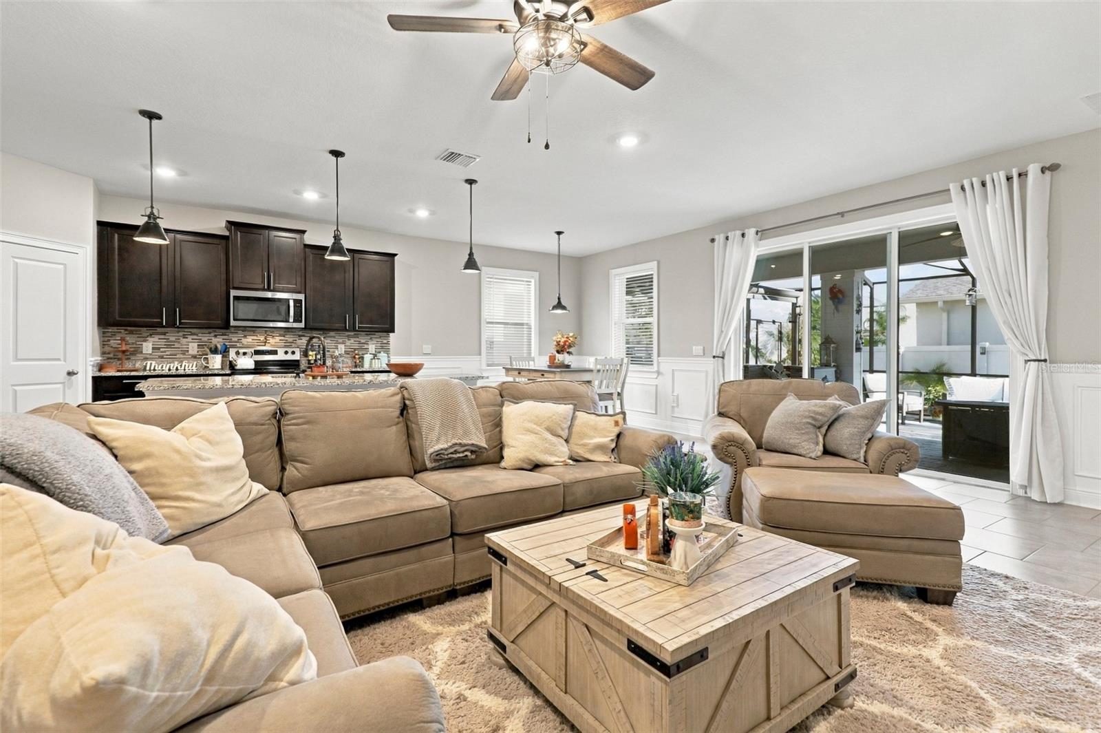 Living Area Flowing Seamlessly into Kitchen and Dining Spaces