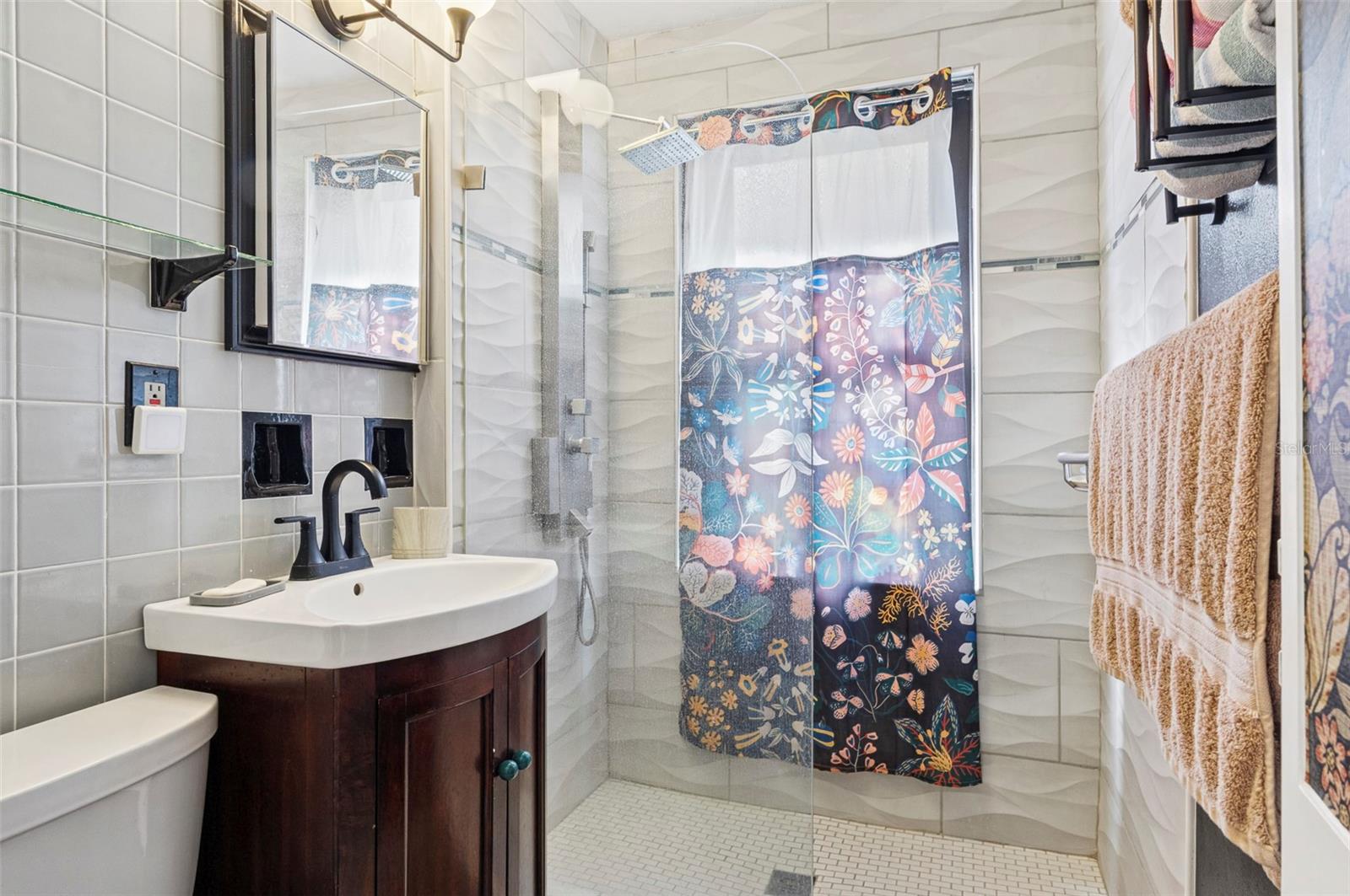 Stylish Bath with Vintage Tile Floors