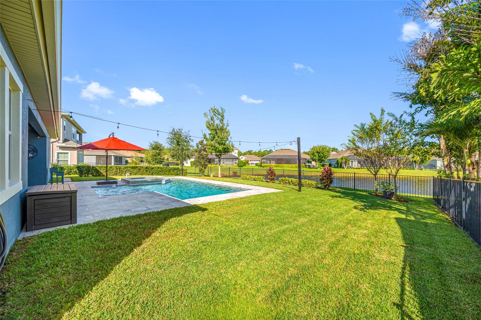 Fully Fenced Backyard on pond