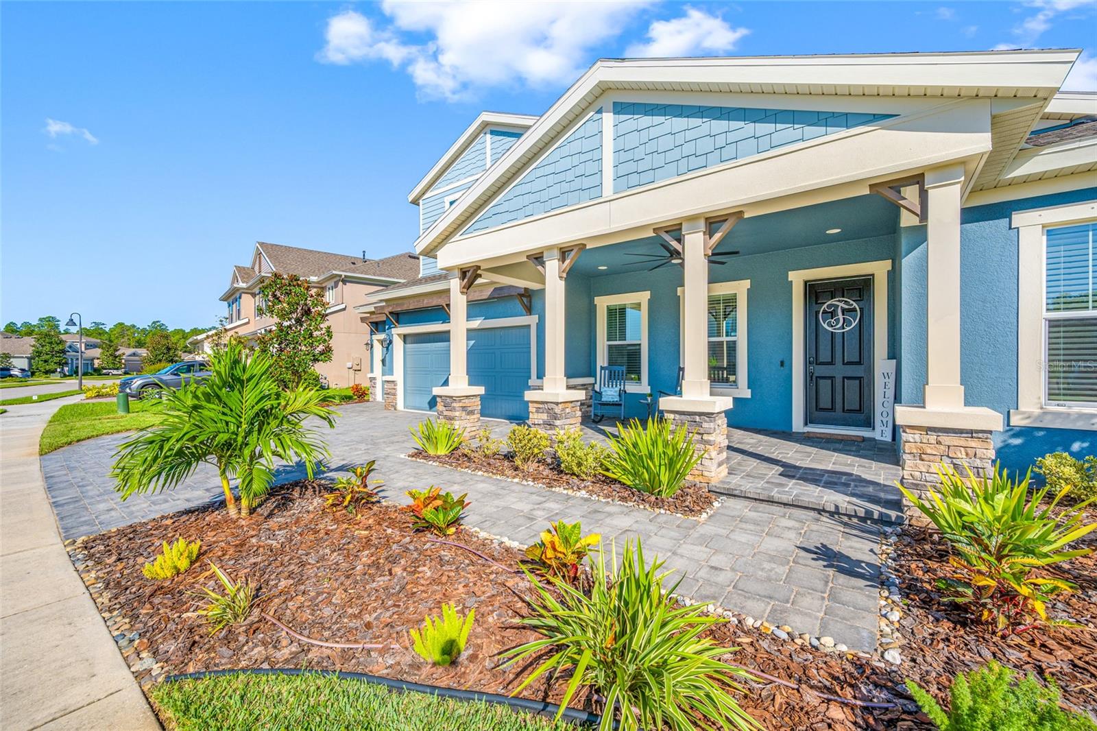 Expansive porch with pavers