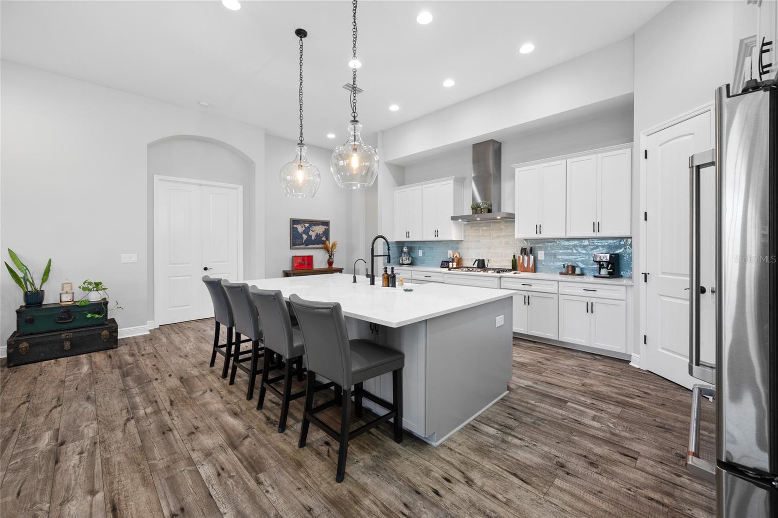 Kitchen has a 9 x 5 foot Quartz Island