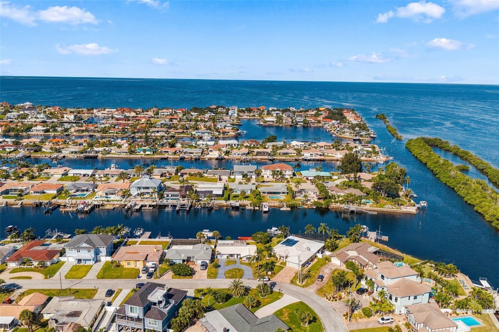 Circular drive for guest parking!  2 minutes or less to the wide open Gulf. Sunset views!