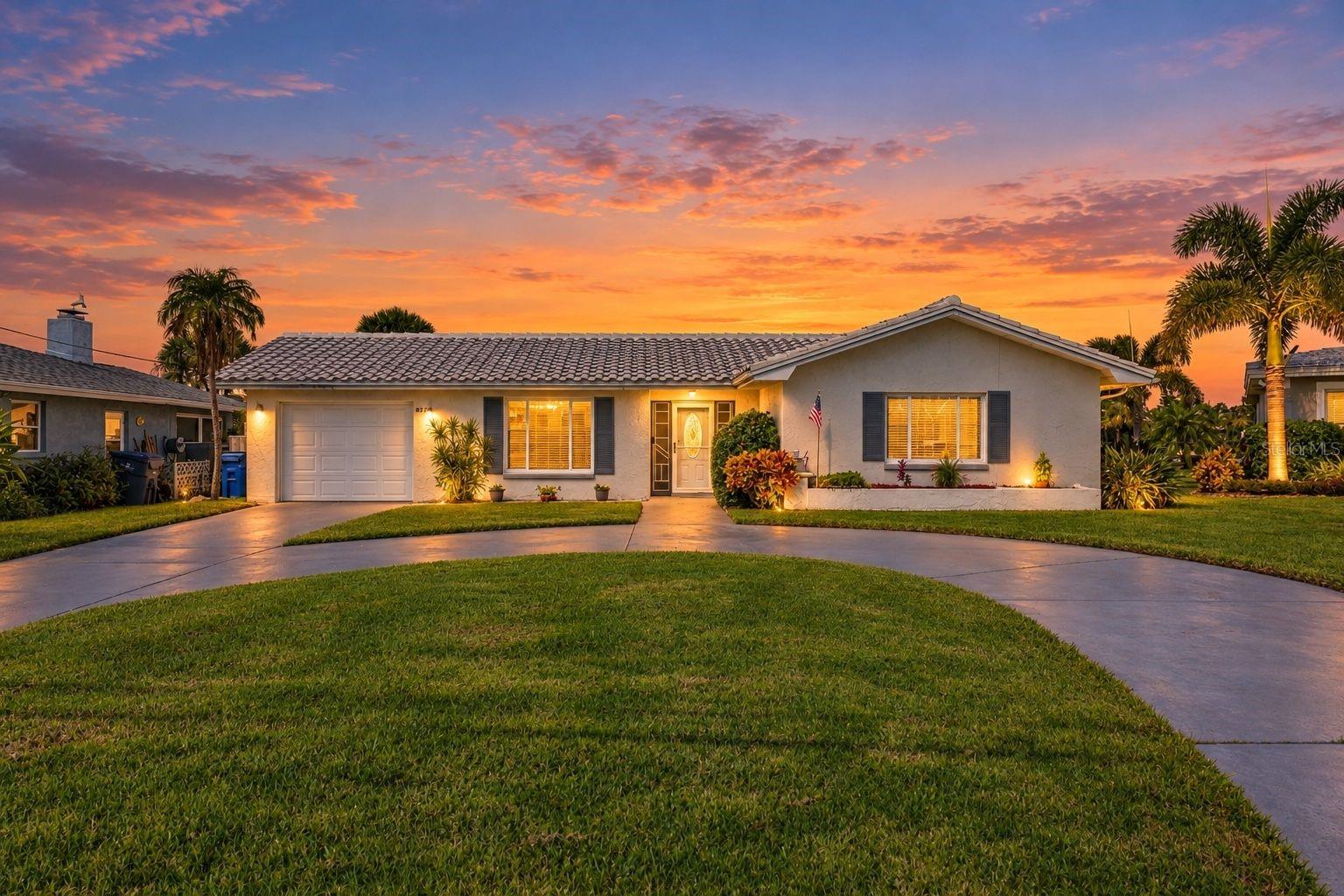 Positioned to enjoy sunrise and sunset.  Large circular drive for guest parking.