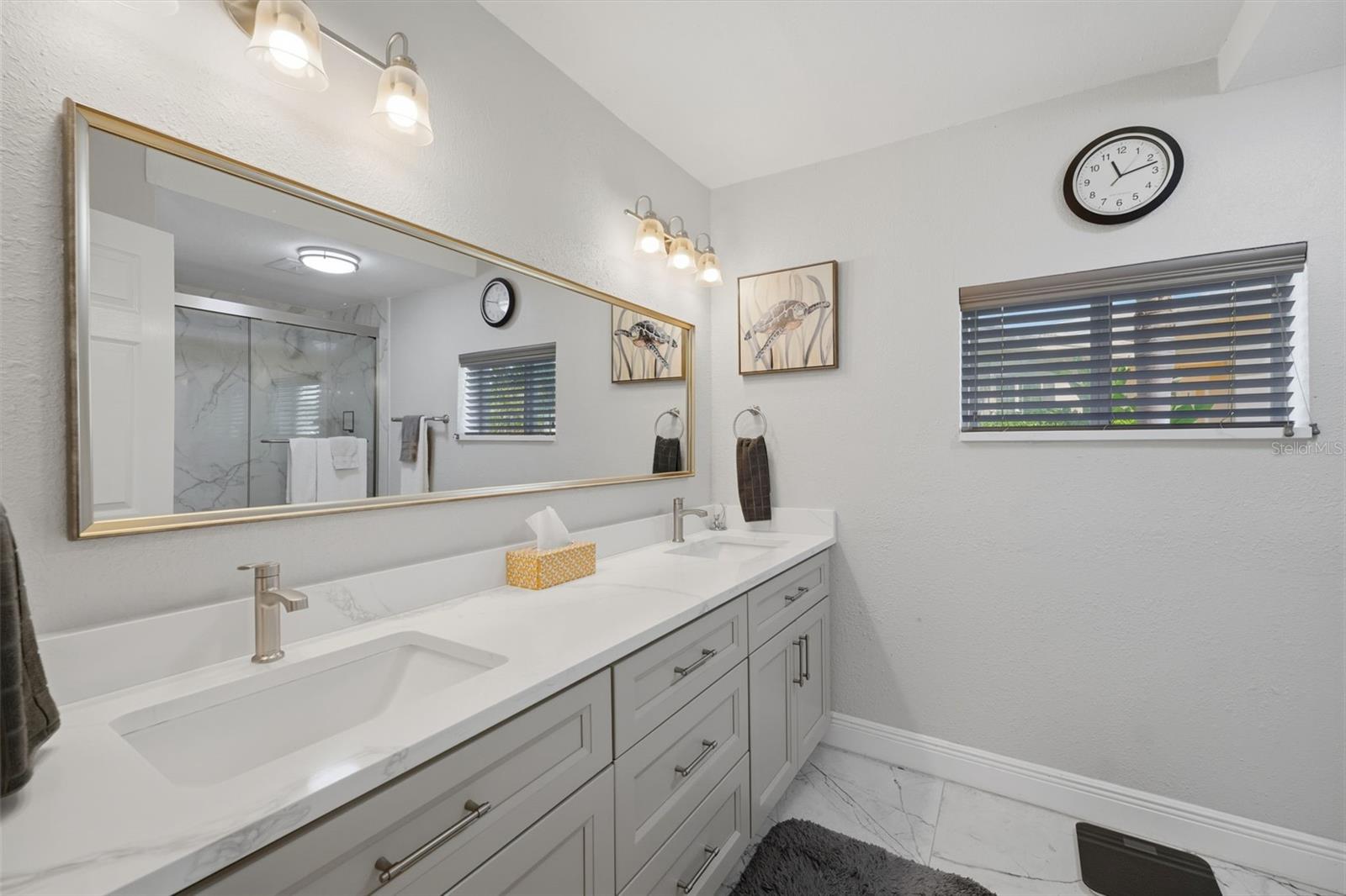 Guest bath boast duel sinks, tub and shower.  Everything is new!