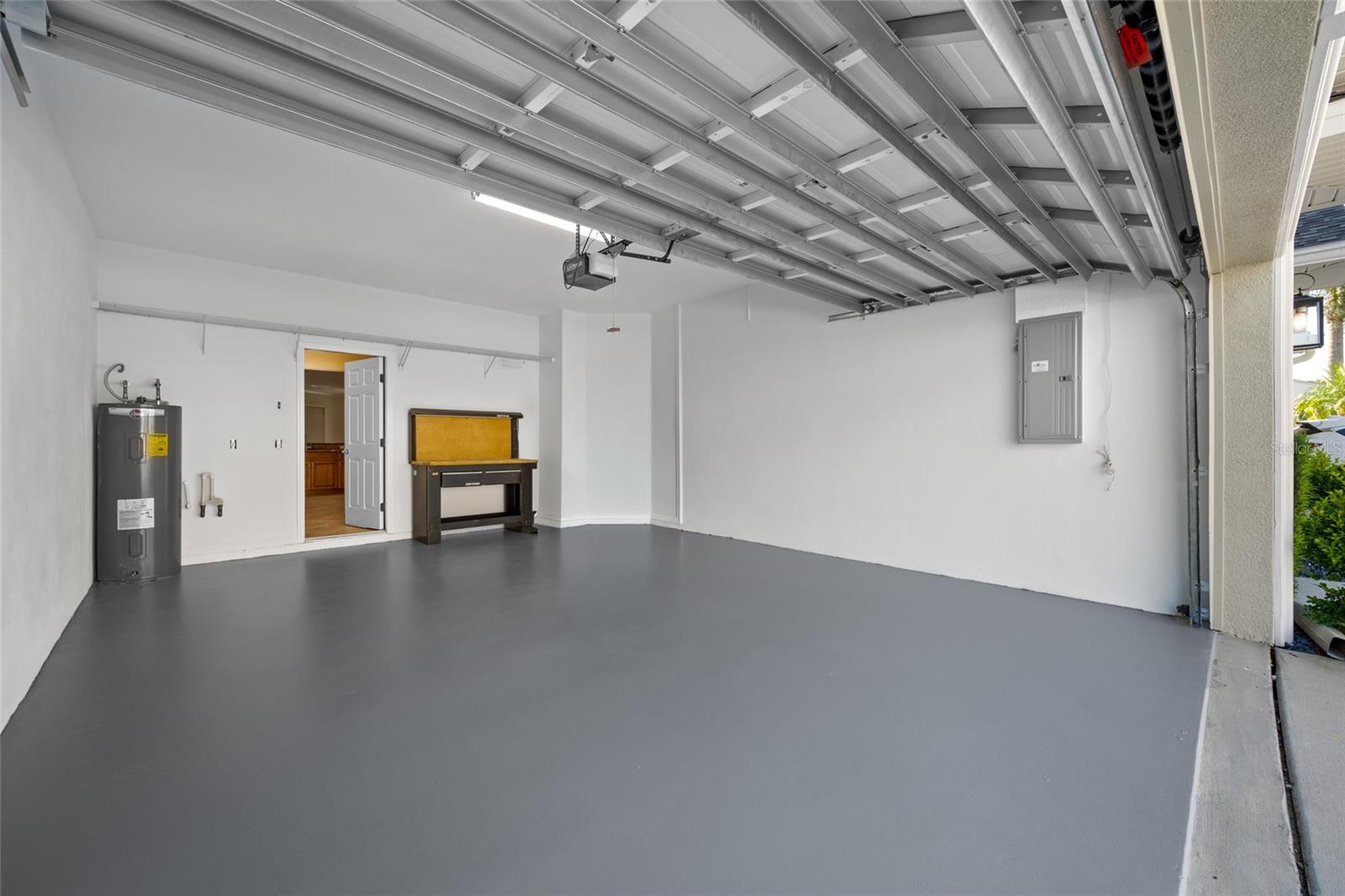 Freshly Painted Garage Walls, Ceiling & Floor!