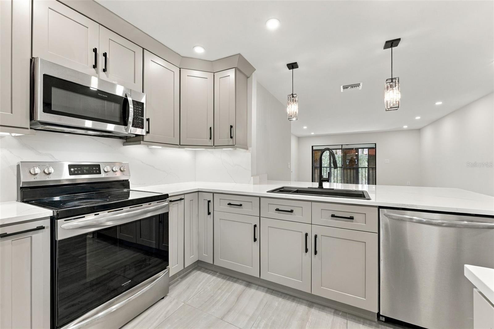 Open kitchen flows seamlessly into the rest of the floor plan