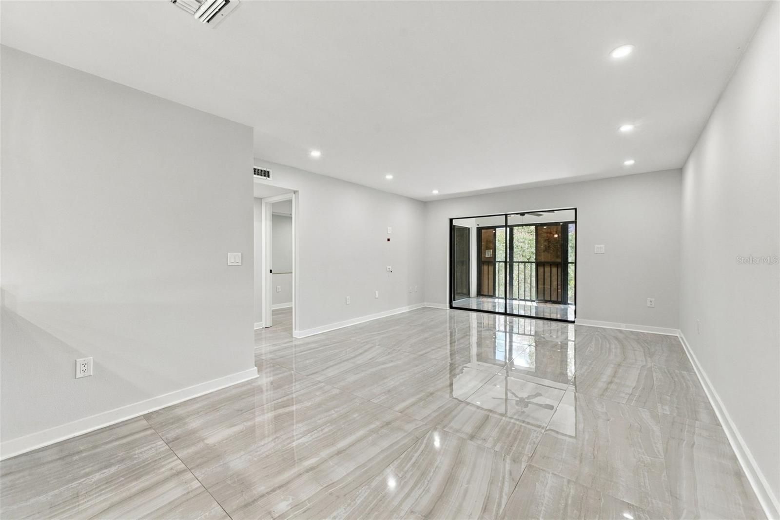 Dining area flows seamlessly into the inviting living room