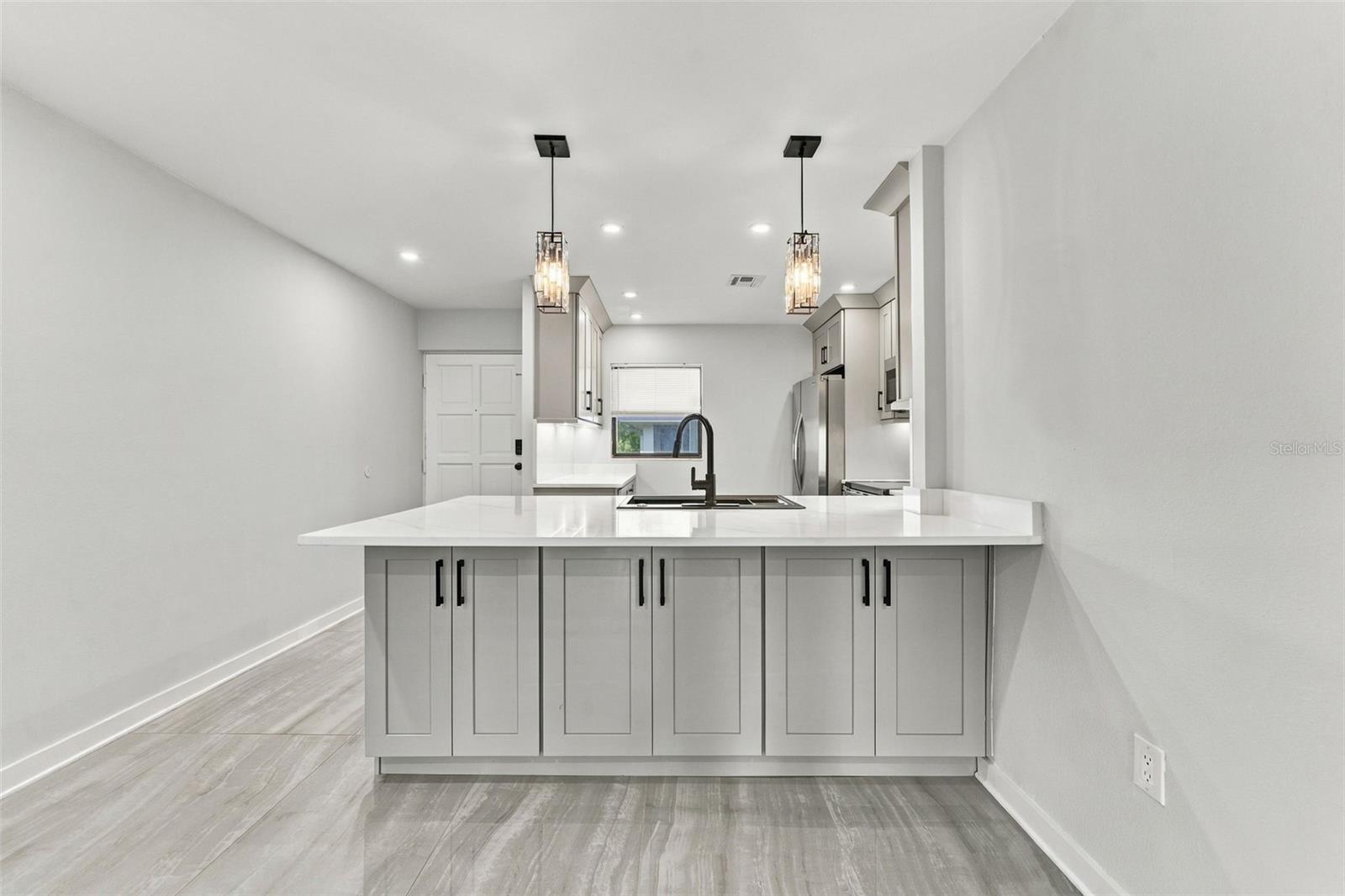 Bar seating in kitchen with additional under counter storage