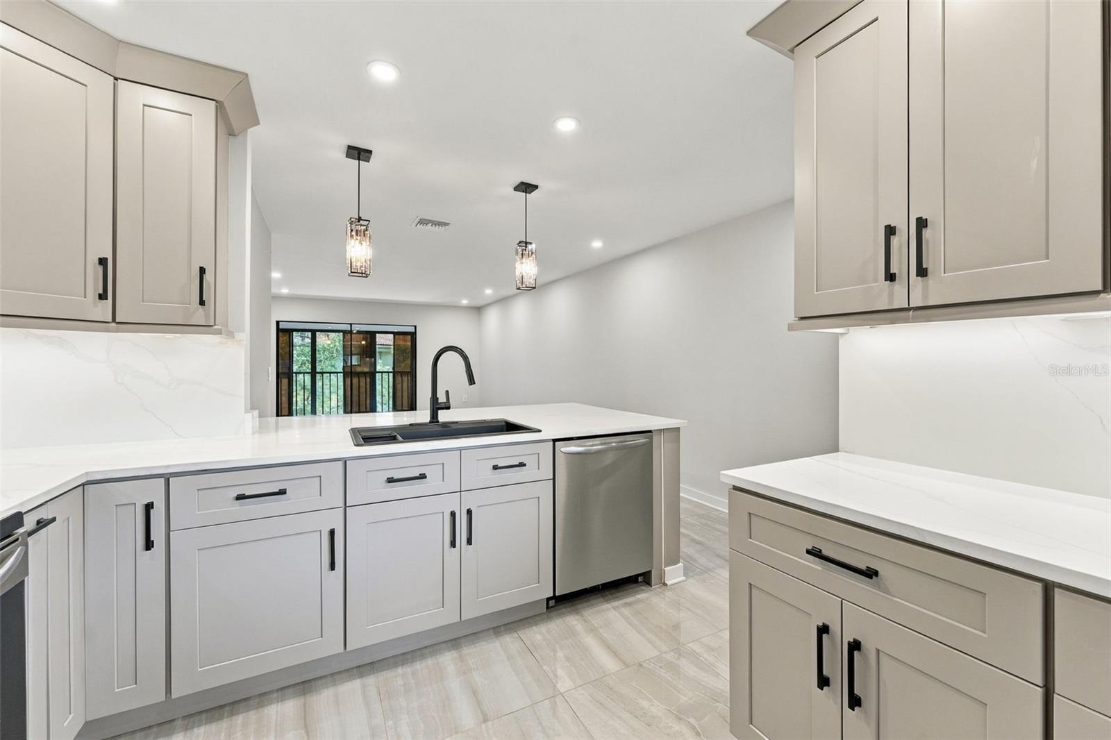 Abundant cabinetry and storage space throughout the kitchen