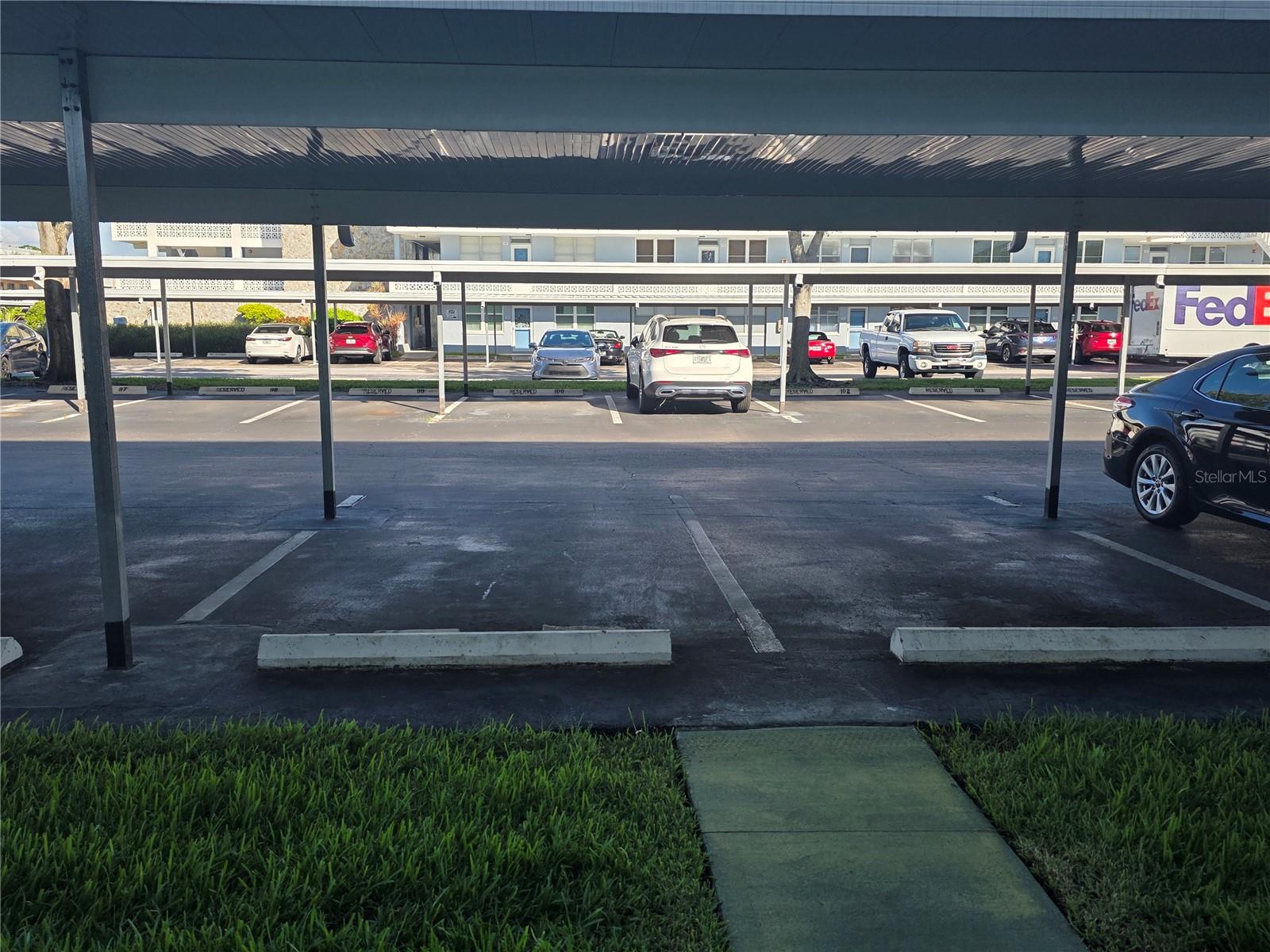 carport is directly in front of condo, just a few steps